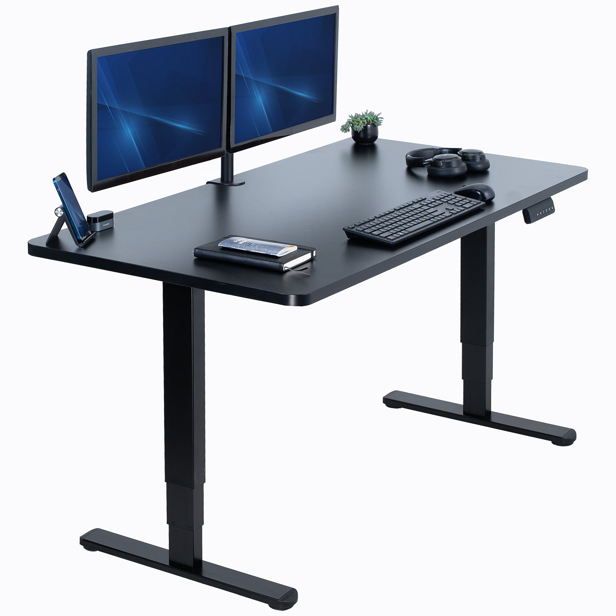 Black adjustable desk with two monitors, keyboard, and mouse on a white background
