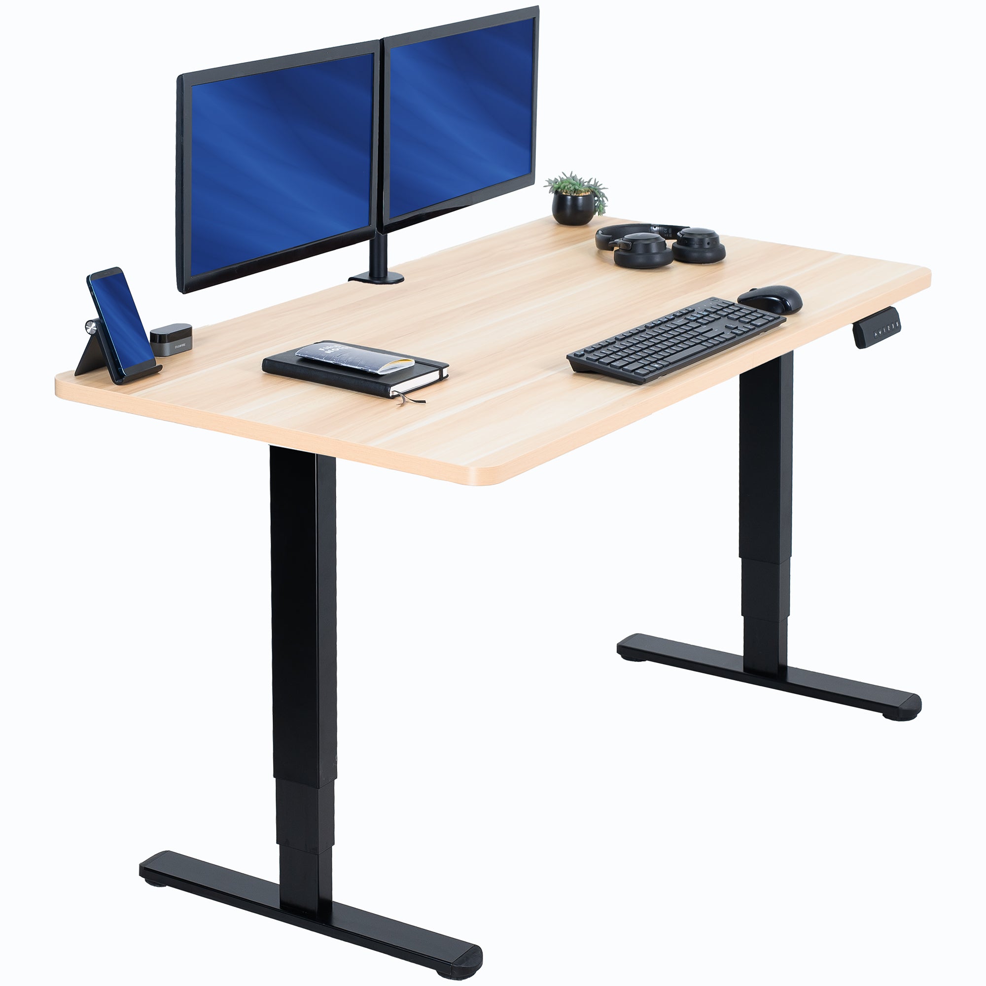 adjustable desk with two monitors, keyboard, and mouse on a white background