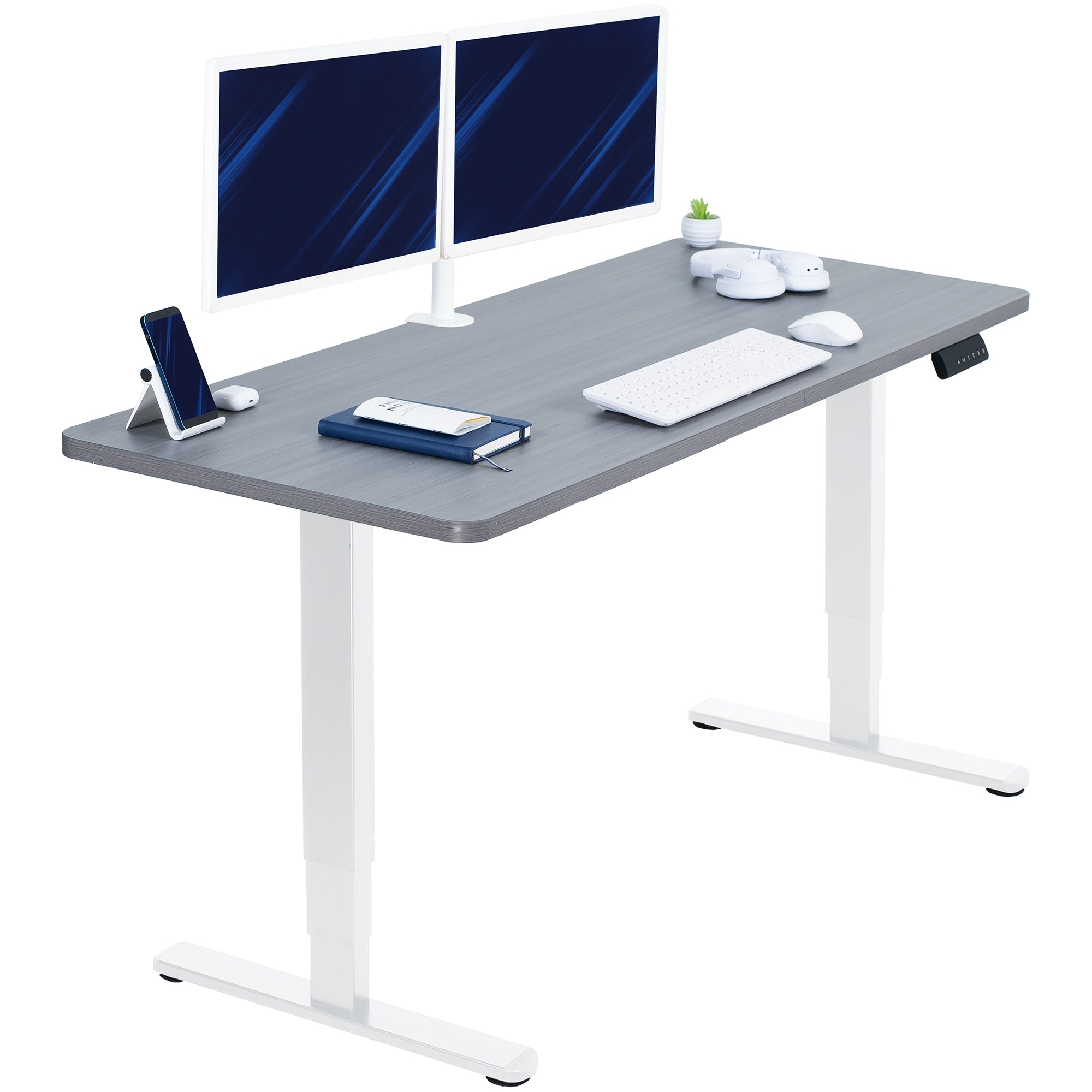Gray desk with white legs, two monitors, keyboard, and office items on a white background