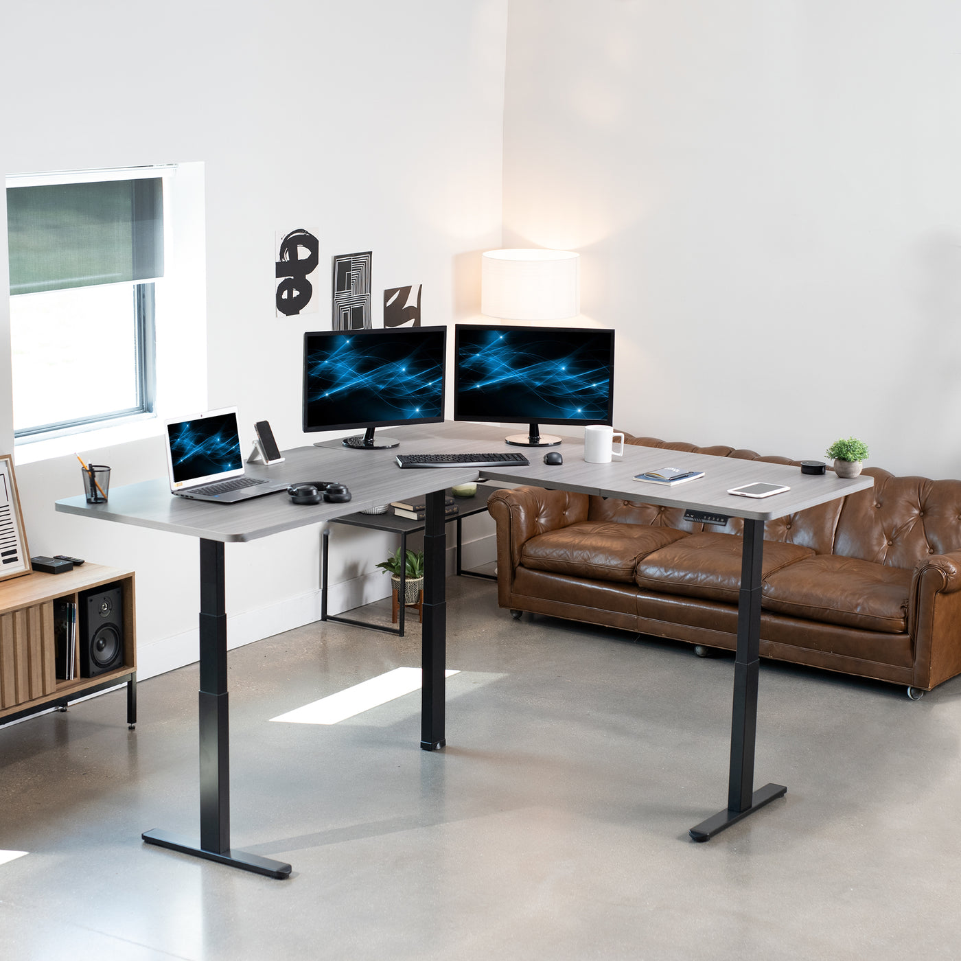 Enjoy a spacious workstation that accommodates an active work life with the Corner 77" x 71" Electric Desk