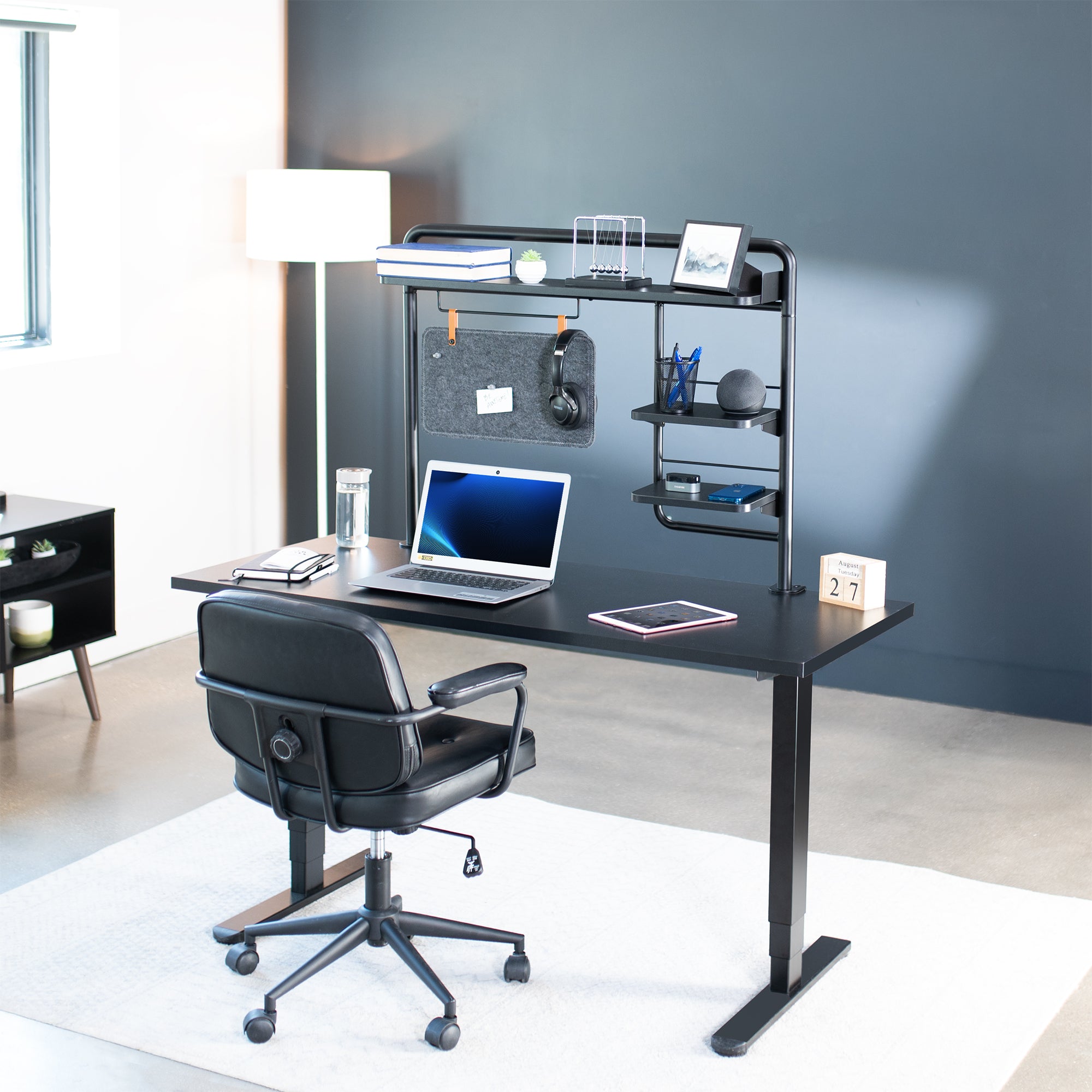 Clamp-on Desktop Shelving System for organizing office workspaces.