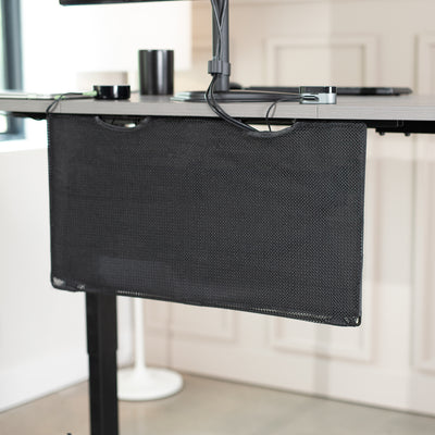 Black Cable Management Desk Organizer helps reduce workspace clutter by routing and concealing cables and power strips.
