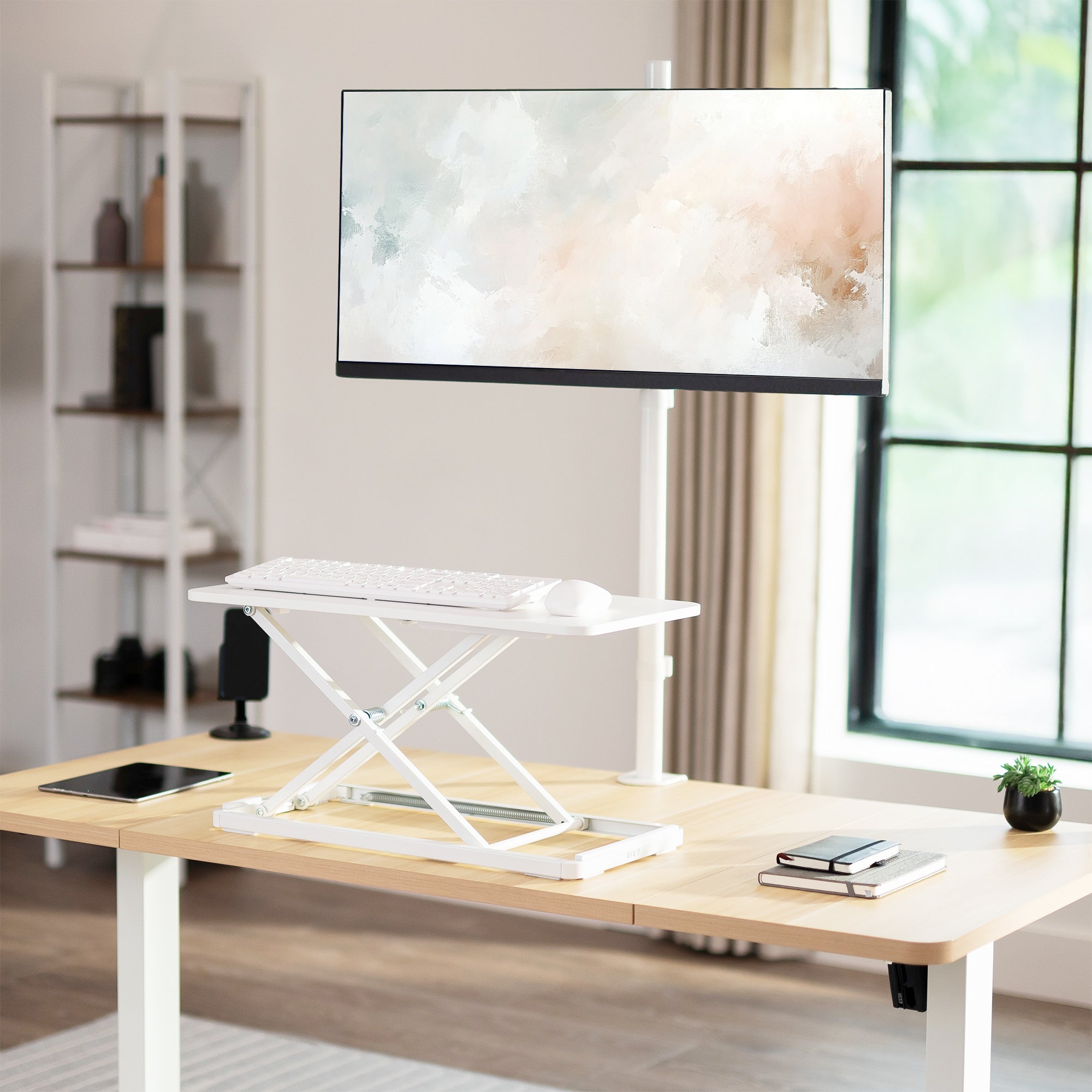 White Single Top Manual Lift Keyboard Riser on a desk in a home office setting