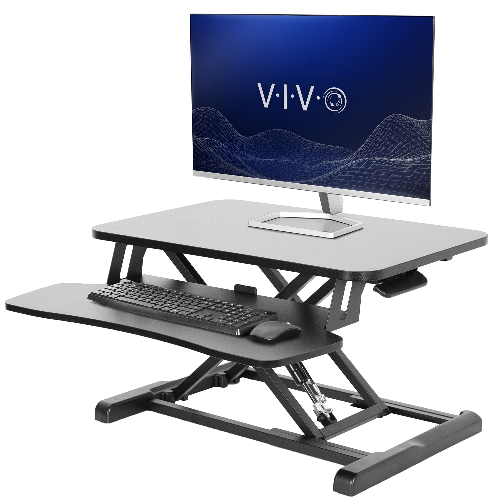 Sturdy height adjustable 2-tiered desk riser for ergonomic office workstation.