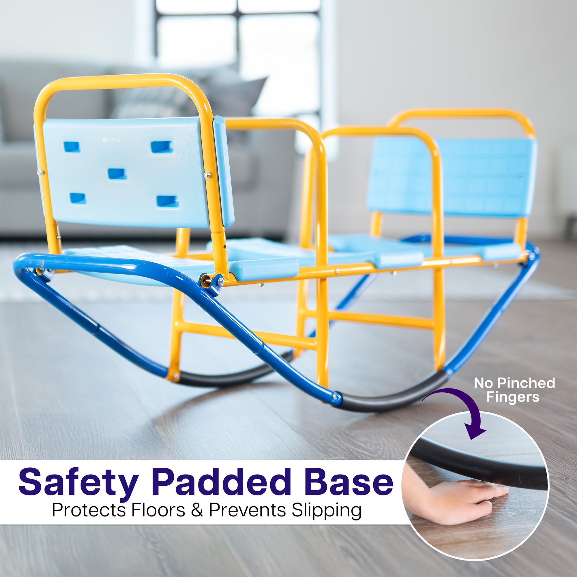 Child's teeter totter with blue and yellow frame on a wooden floor.