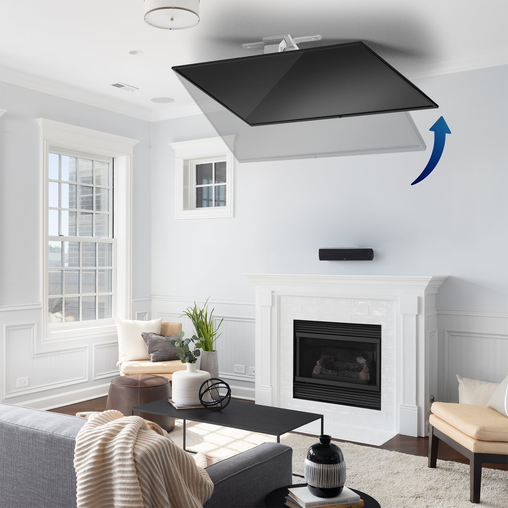Ceiling-mounted TV with folding capabilities in a modern living room with a fireplace.