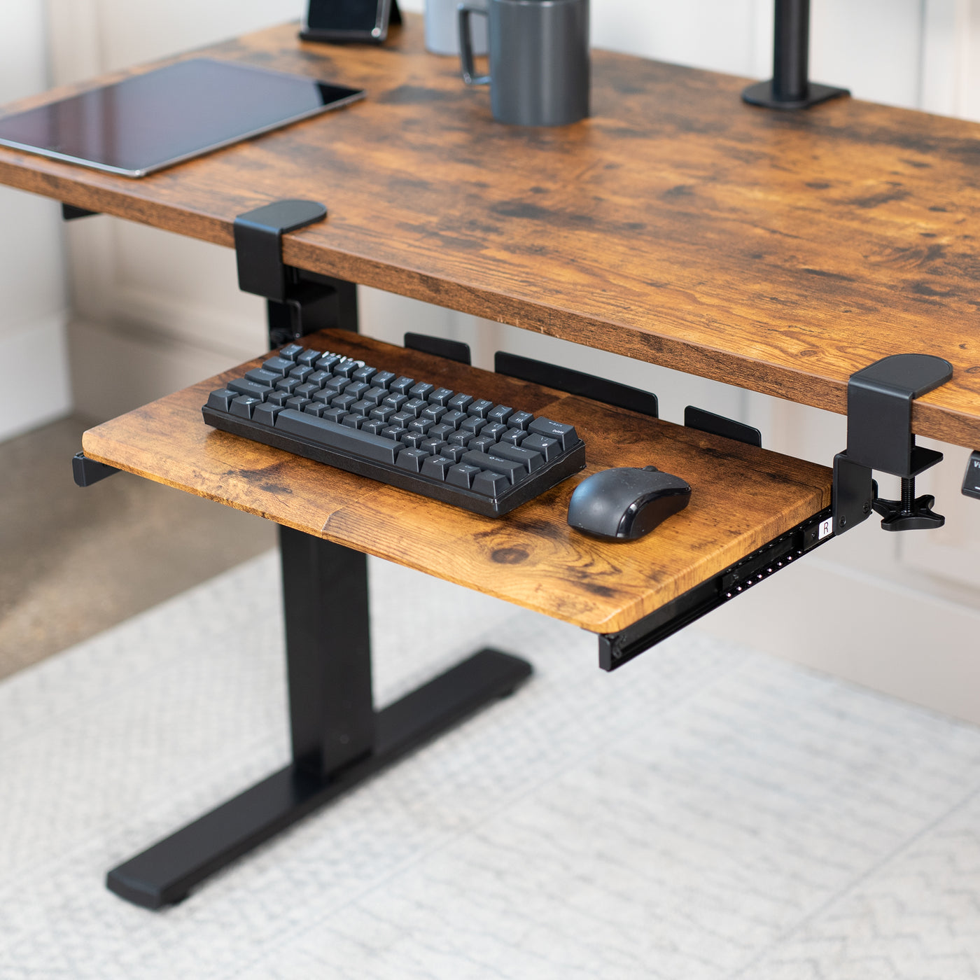 Rustic compact clamp-on pullout keyboard tray.