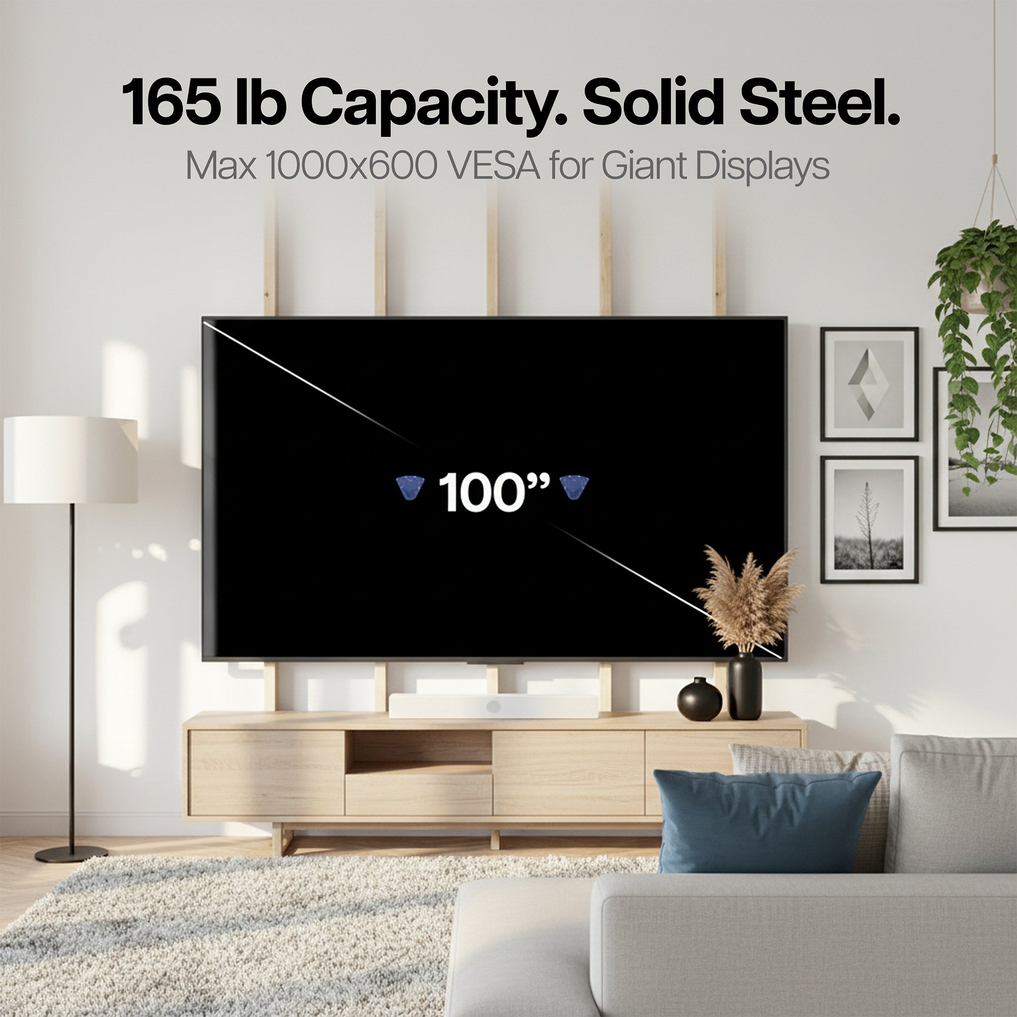 Large TV screen in a living room mounted on a TV Wall Mount with text about weight capacity and VESA size.