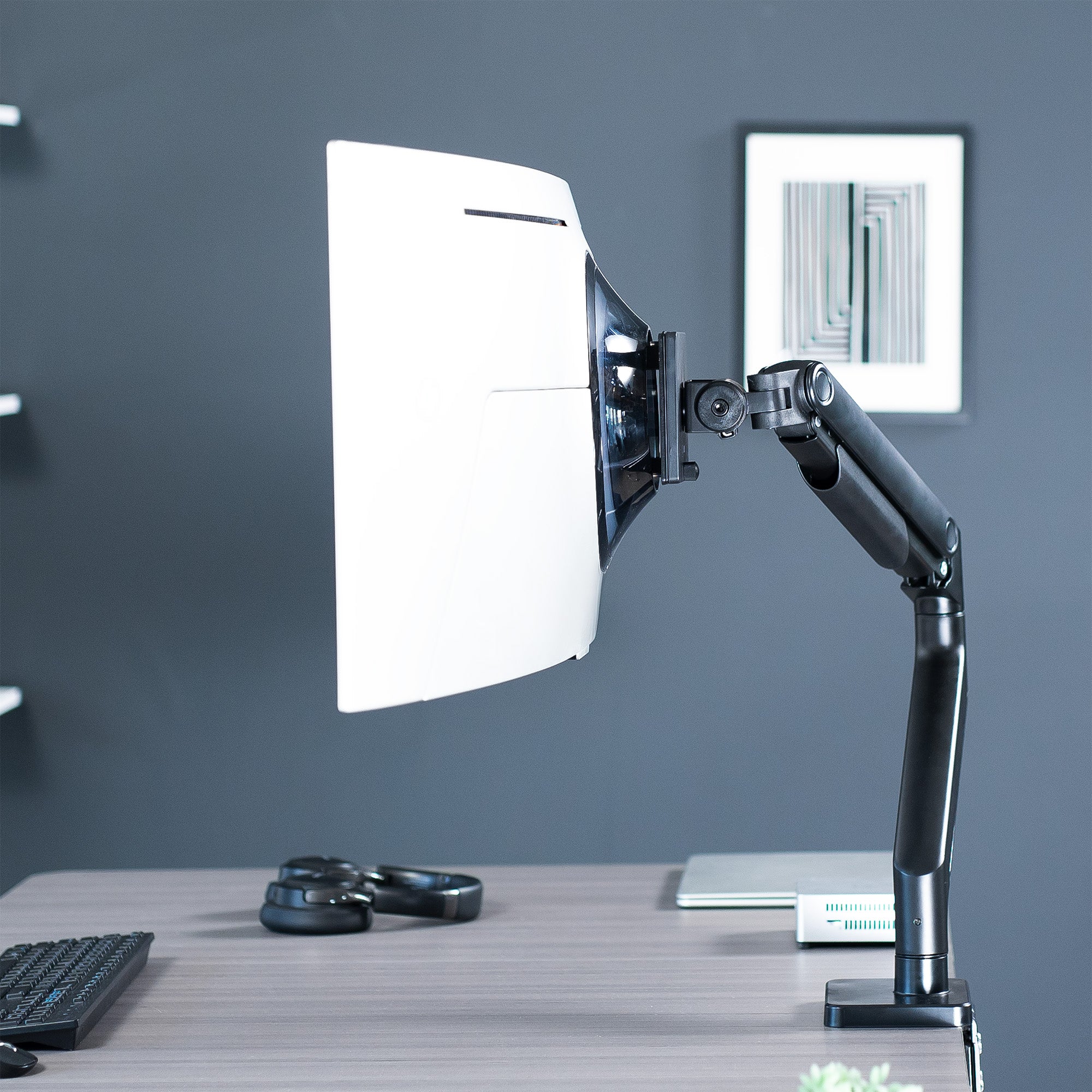 A black VESA adapter designed for a Samsung OLED G9 monitor.