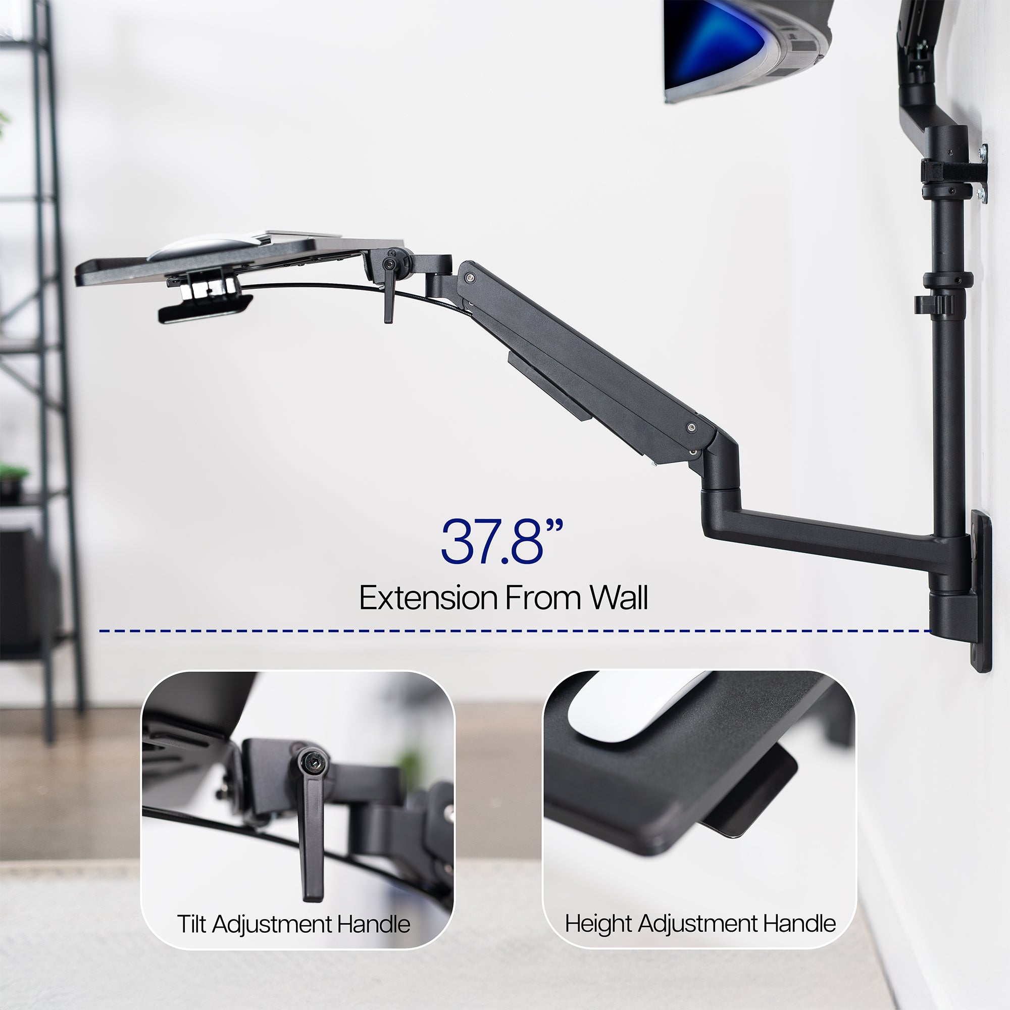 Wall-mounted monitor mount and keyboard tray with extension measurement and adjustment handles on a white background.