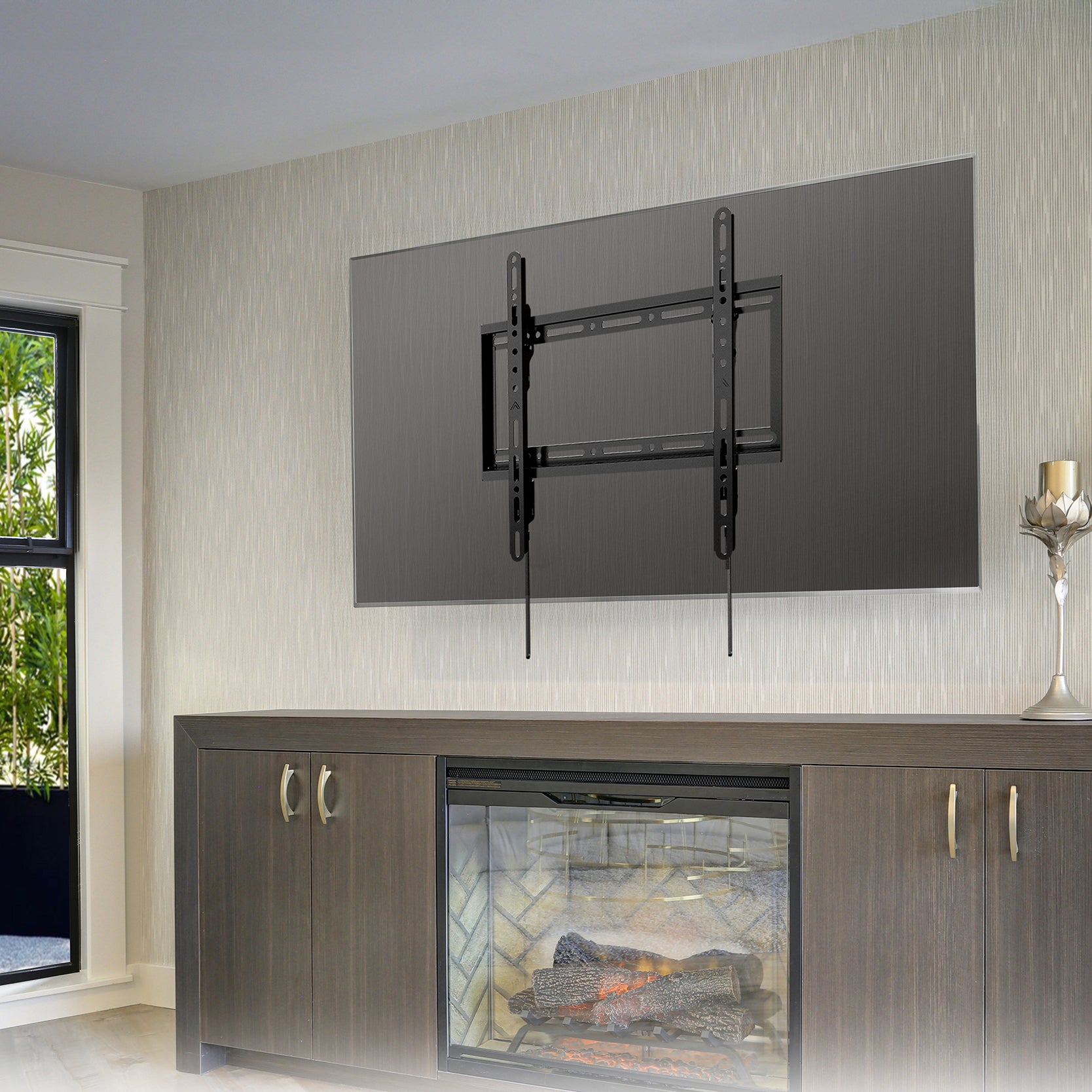 Wall-mounted TV above a fireplace.