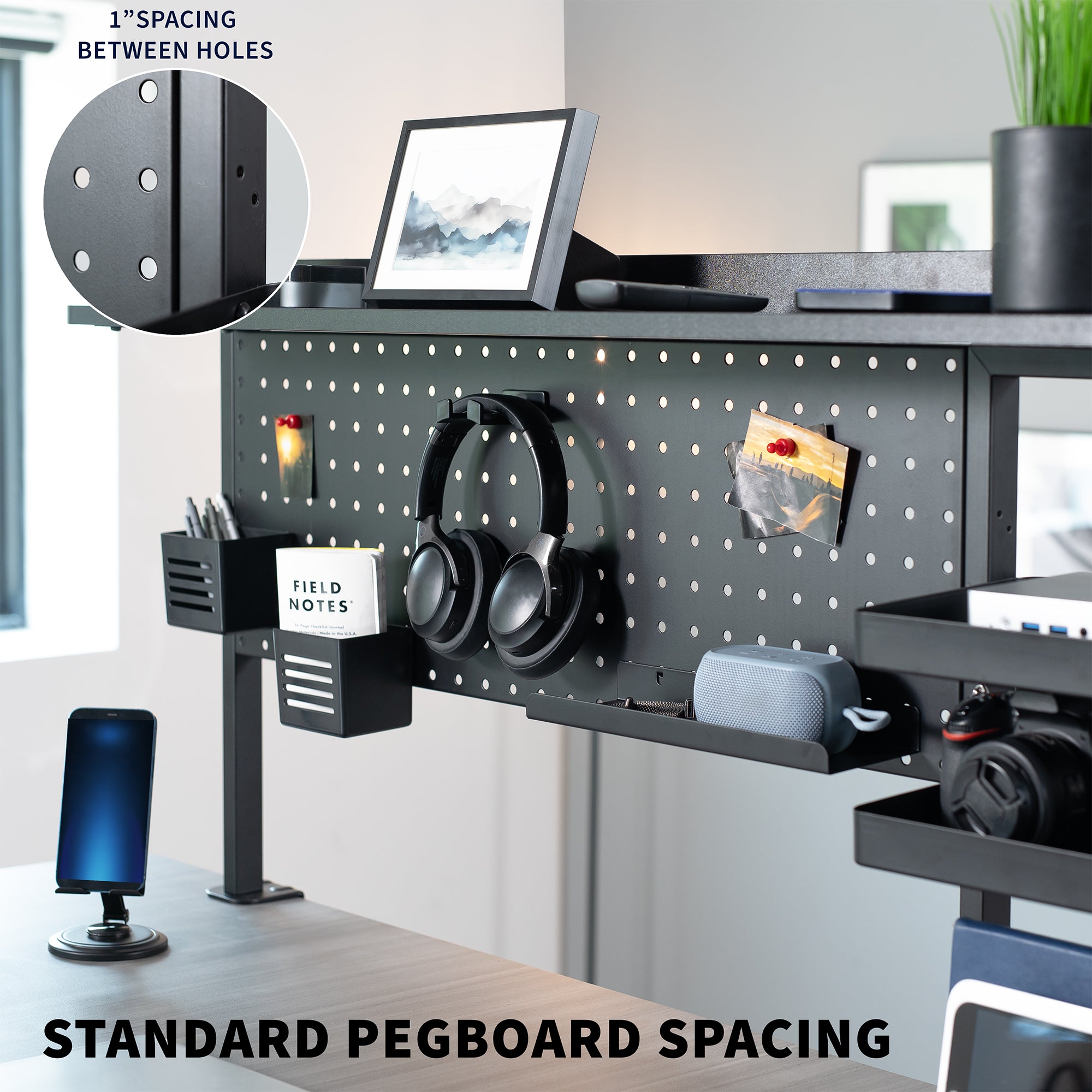 Pegboard with various office items on a desk, showing standard pegboard spacing.