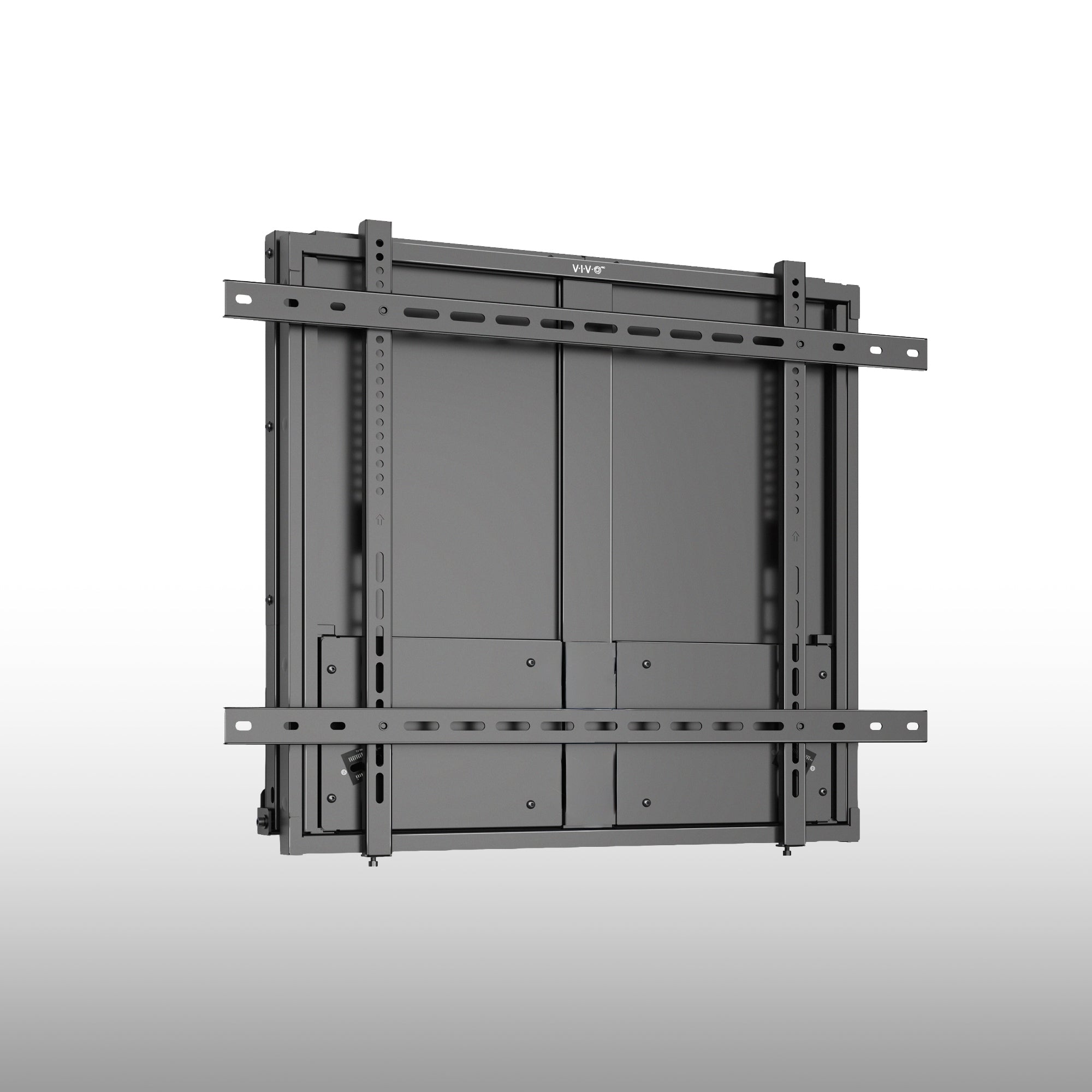 A black wall-mount TV bracket with multiple mounting plates and screws, shown from a three-quarter angle against a light gray gradient background.