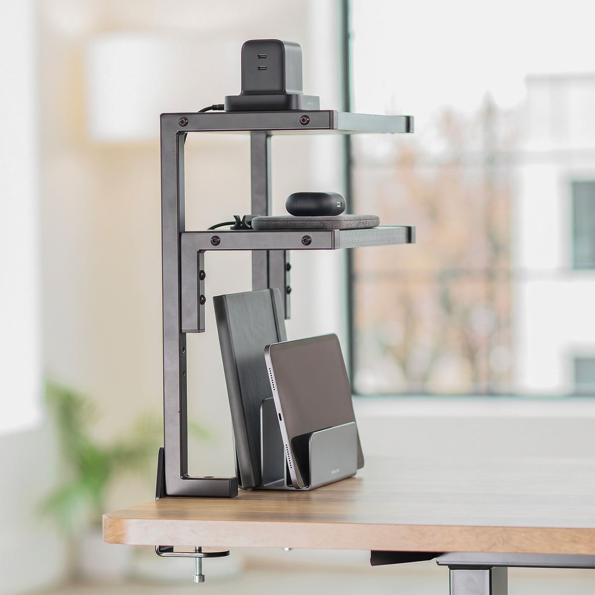 Organized dual-level display shelf shown in workspace