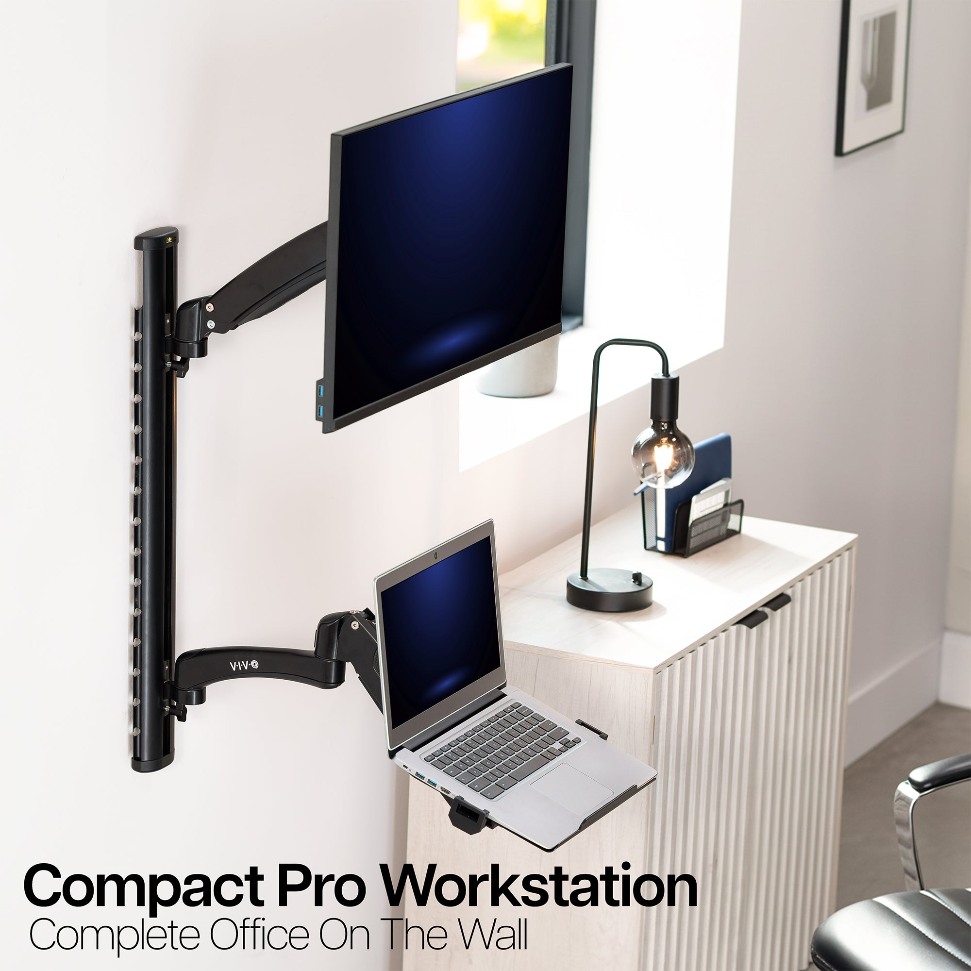 Compact Pro Workstation with monitor and laptop on a white wall.