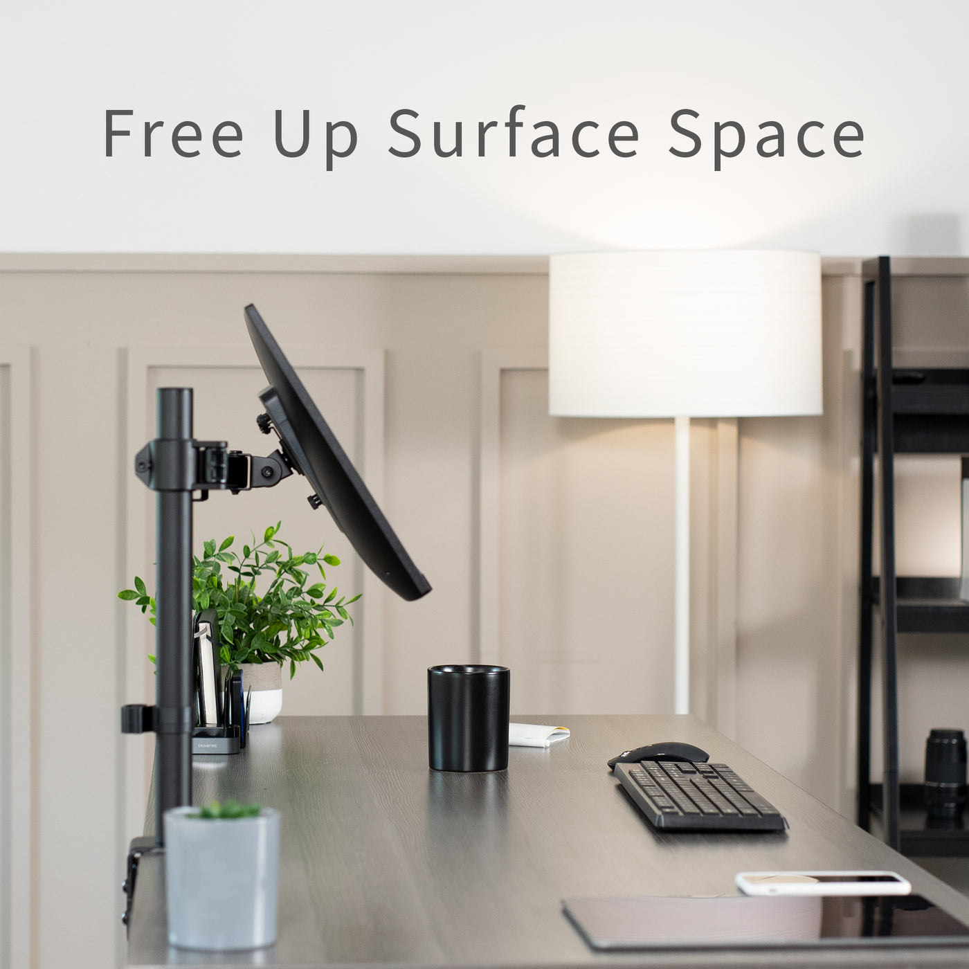 Free up surface space by elevating your monitor off of your main desktop surface.