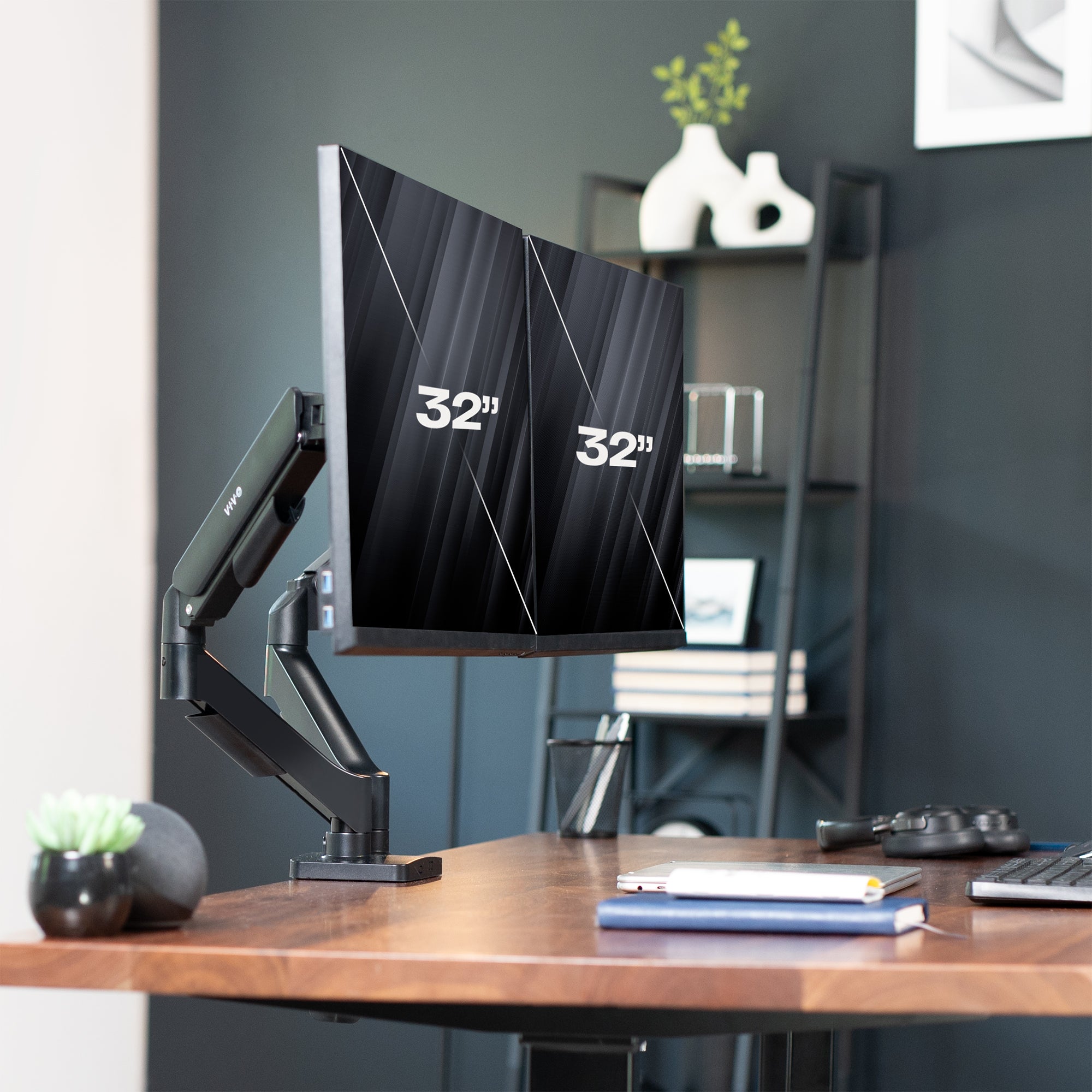 Sturdy adjustable mechanical arm dual monitor ergonomic desk stand for office workstation.