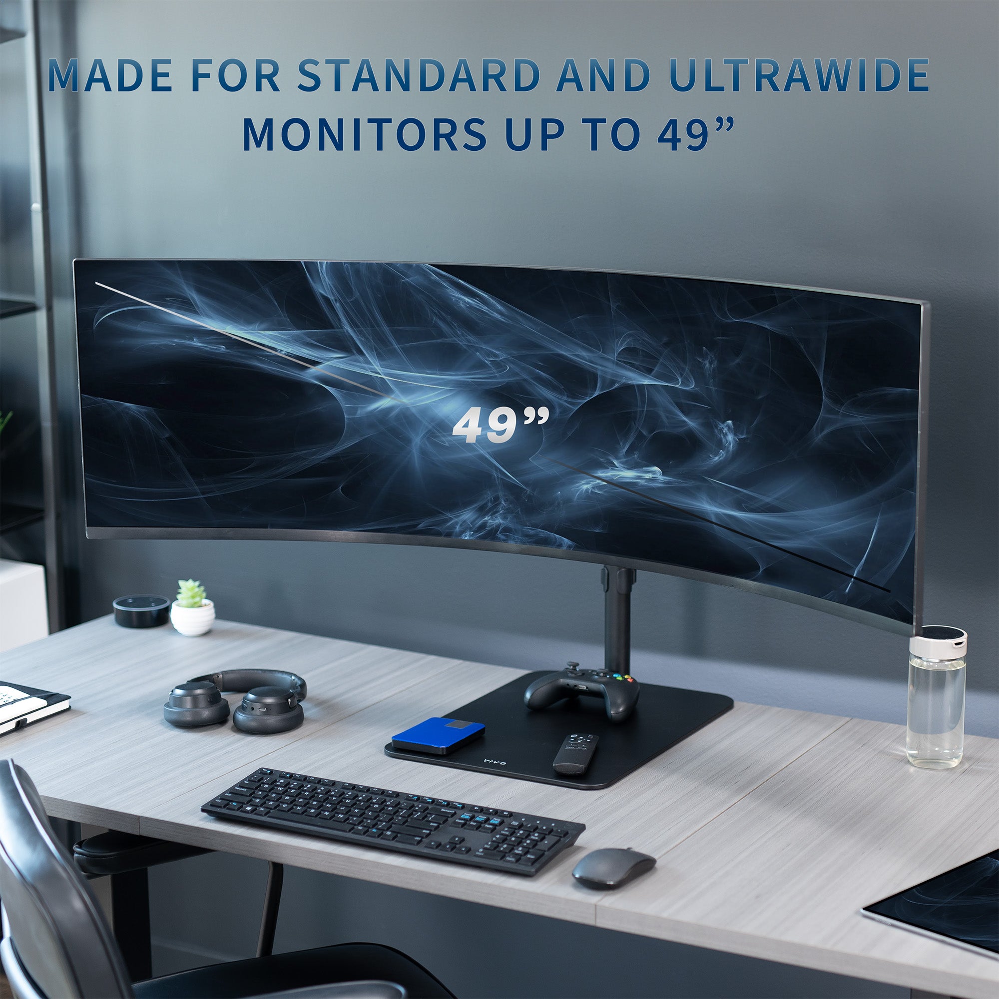 Large monitor on a desk with text about screen size compatibility