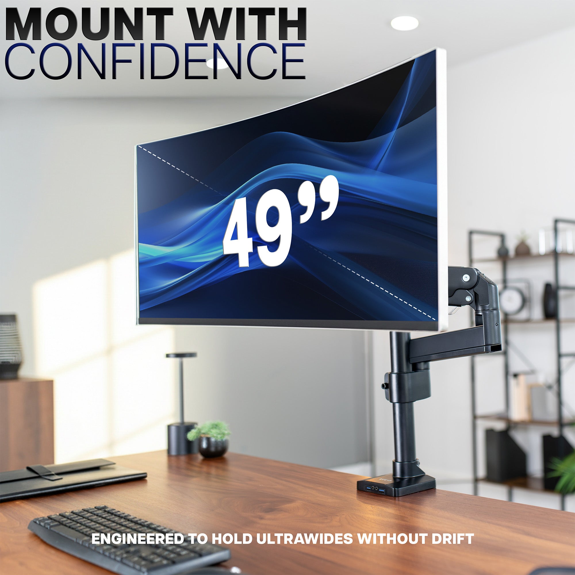 Monitor on a desk with 'Mount with Confidence' text and '49''' display
