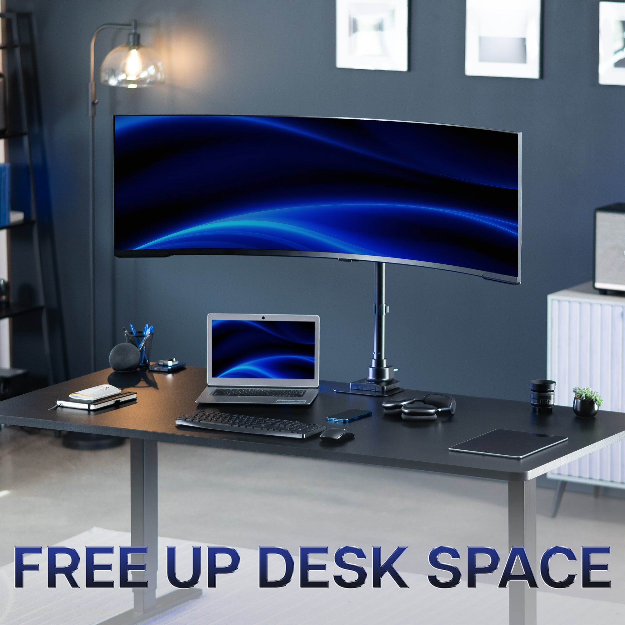 Modern office desk setup with an ultrawide monitor mounted