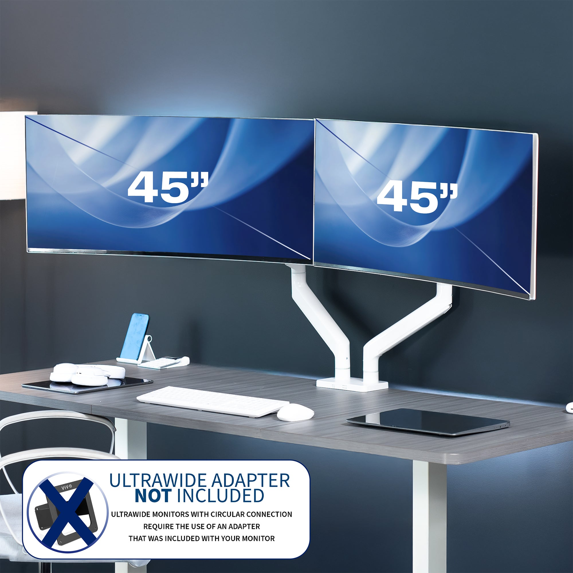 Two 45-inch ultrawide monitors on a desk with a dark wall background.