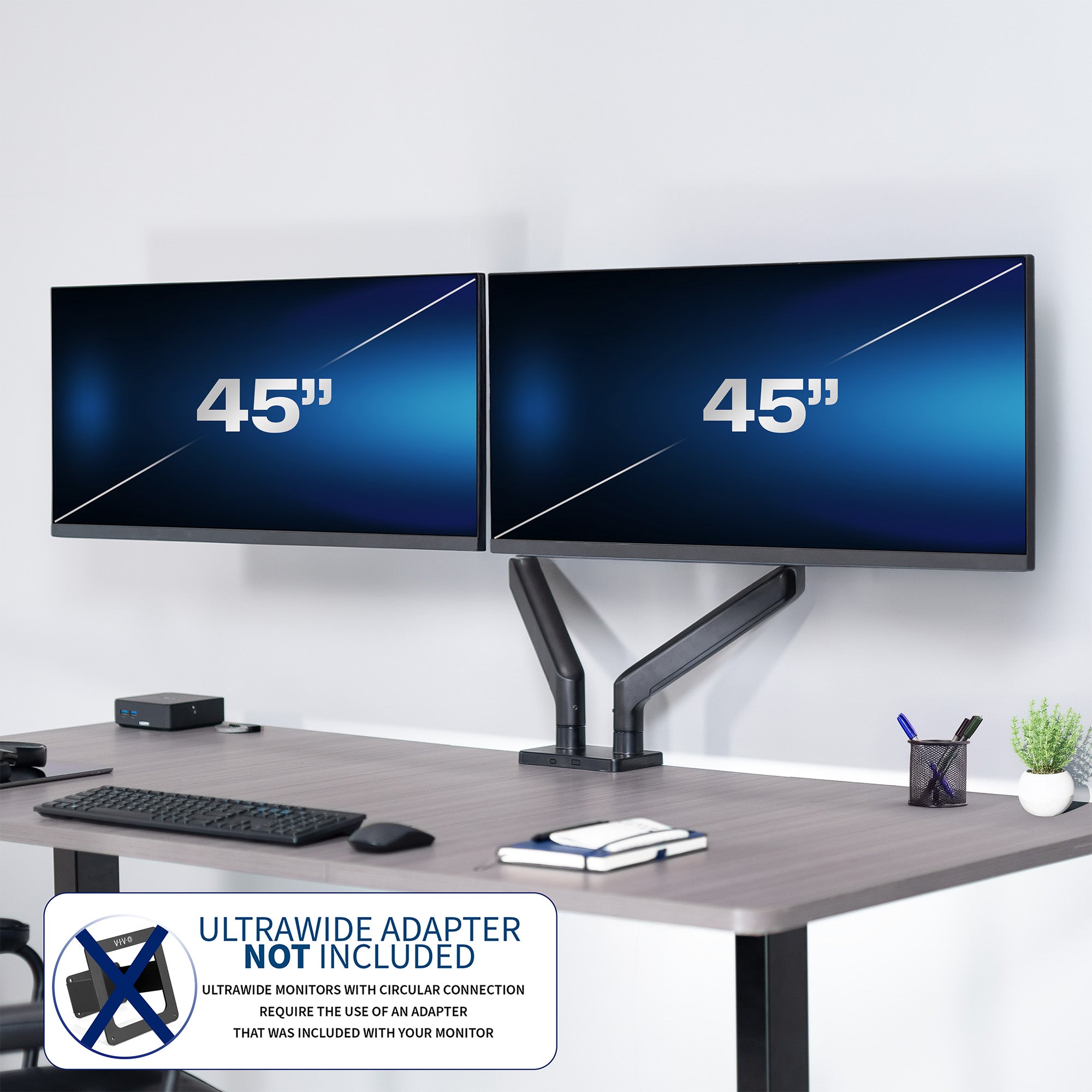 A dual monitor desk mount with pneumatic arms, capable of supporting ultrawide screens in an office setting.