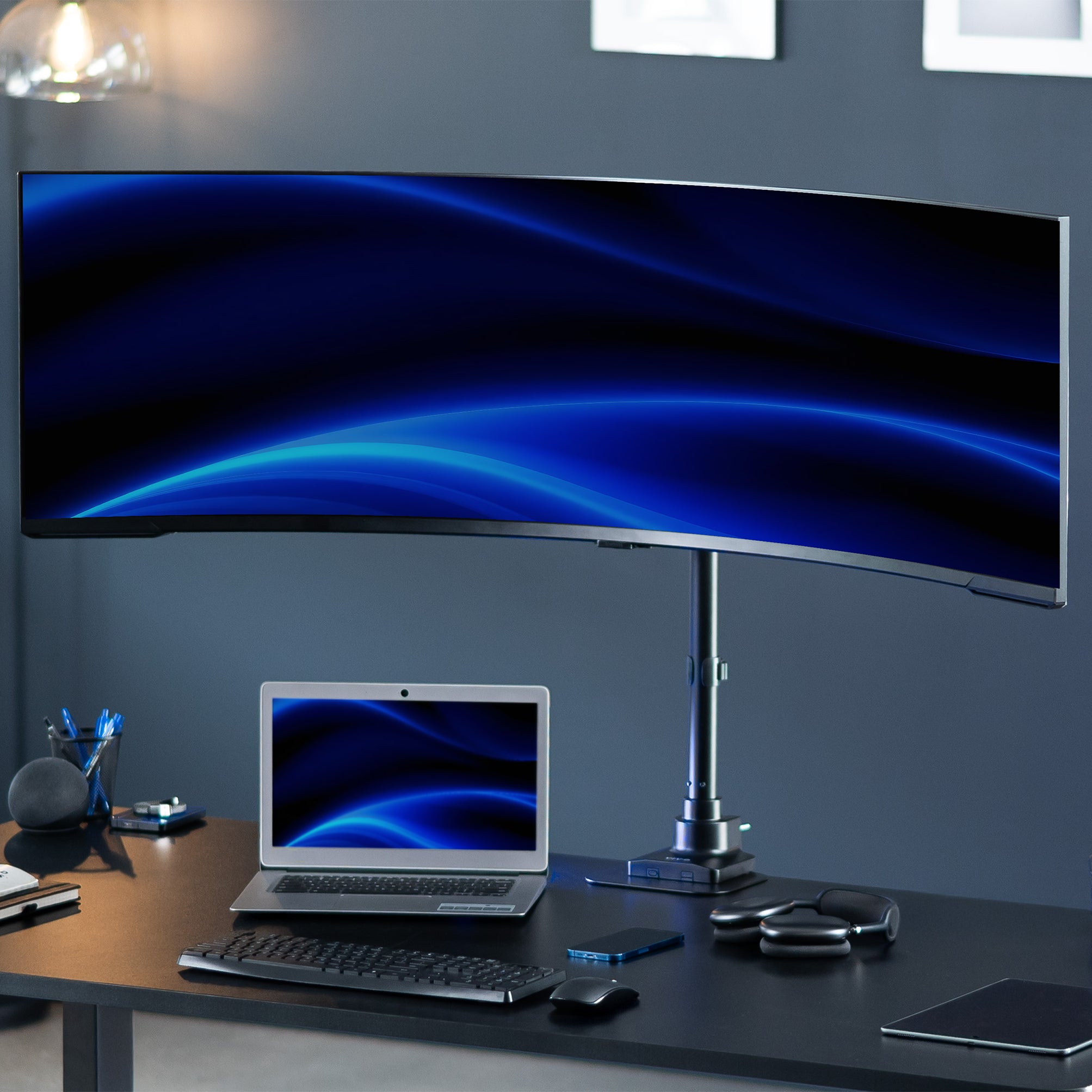 Ultrawide monitor mounted on office desk