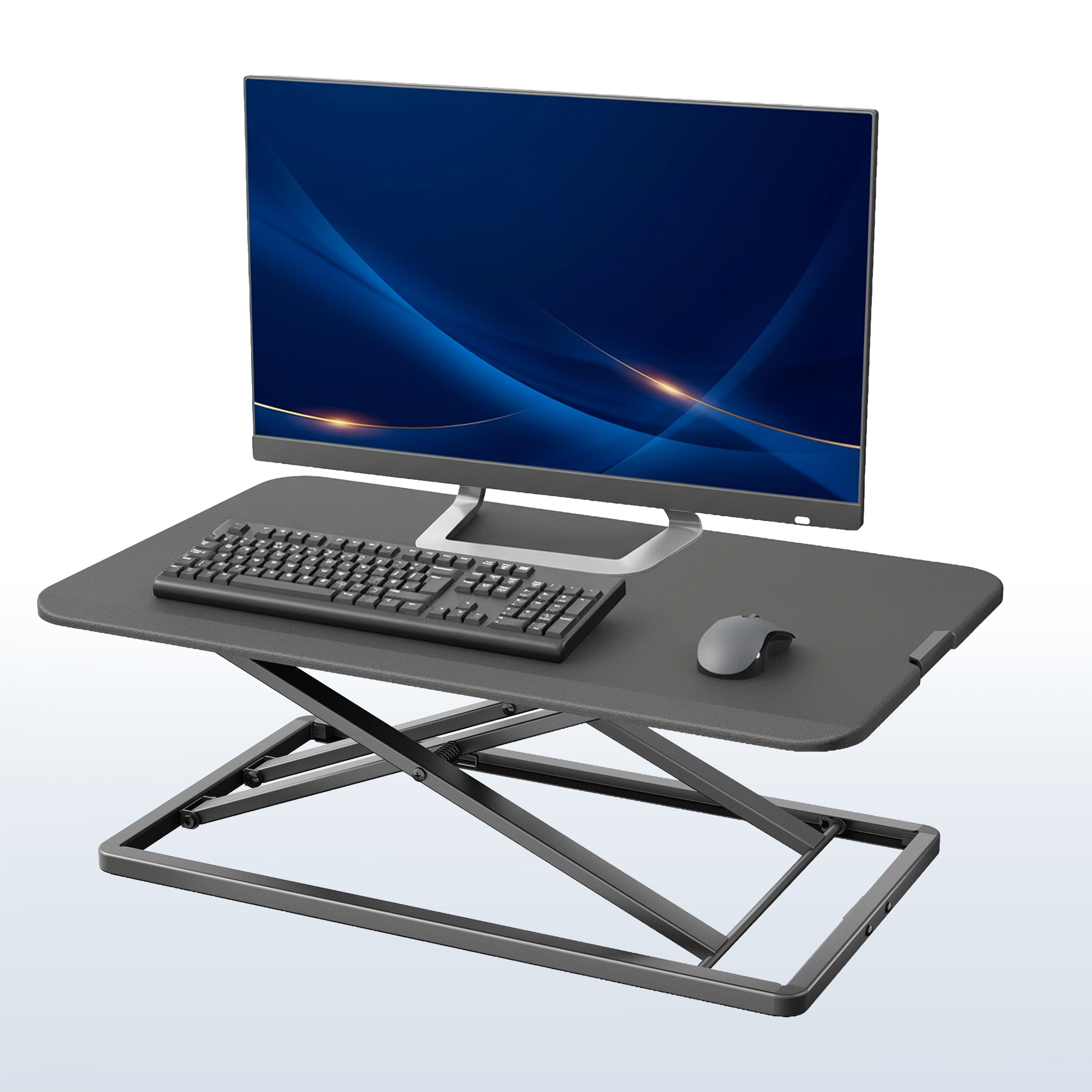 Heavy-duty height adjustable desk converter monitor riser.