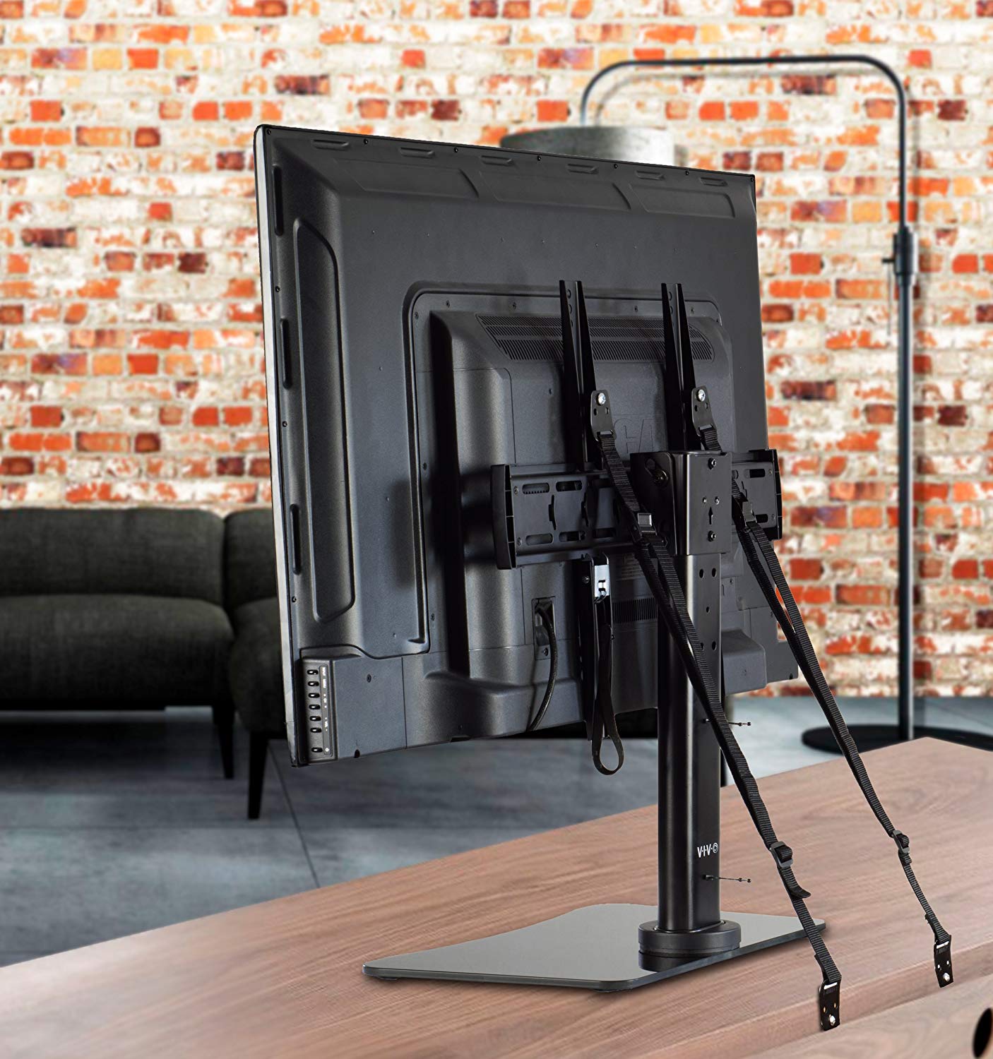 Heavy-duty strap cable management for extra secure TV mounting.