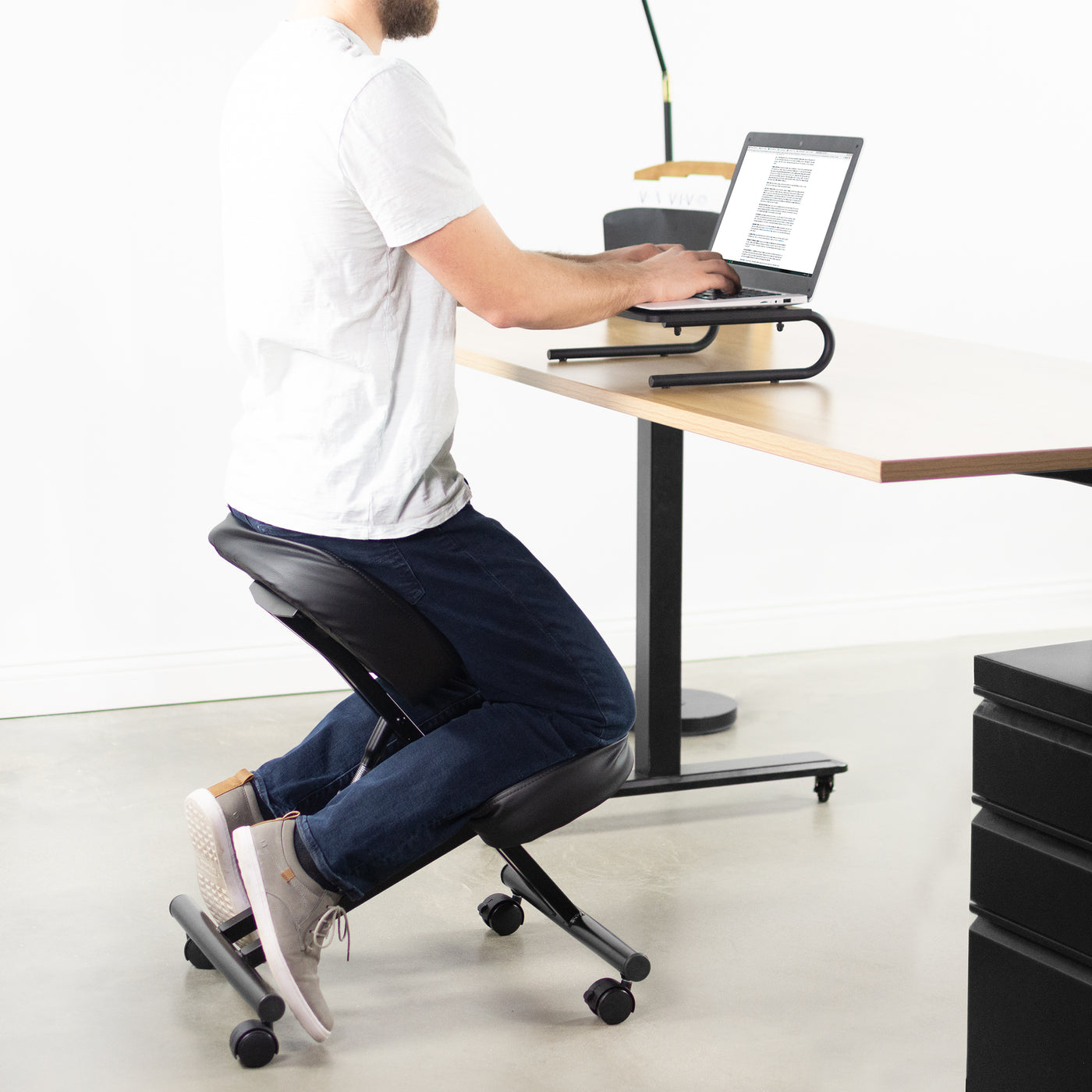 Maximize comfort working at your office desk with a padded kneeling chair.