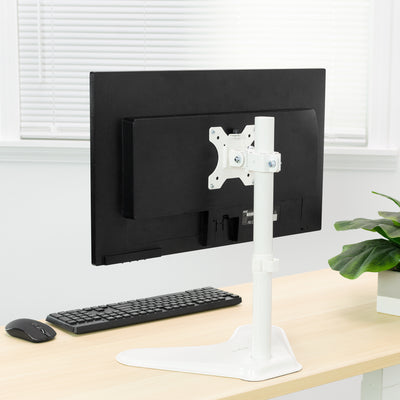 White VESA plate monitor stand with a mounted screen.
