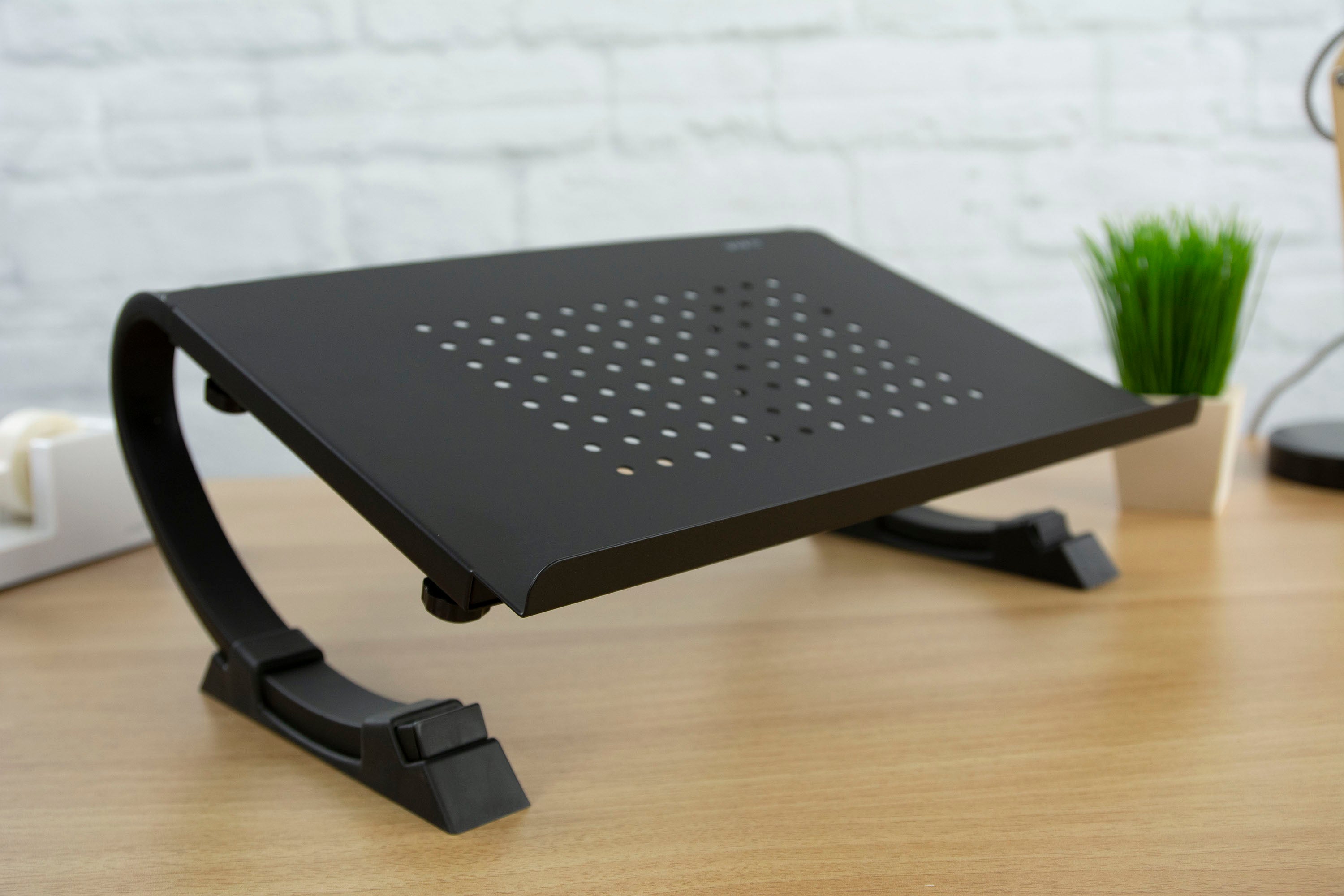 Sturdy and adjustable black laptop stand.