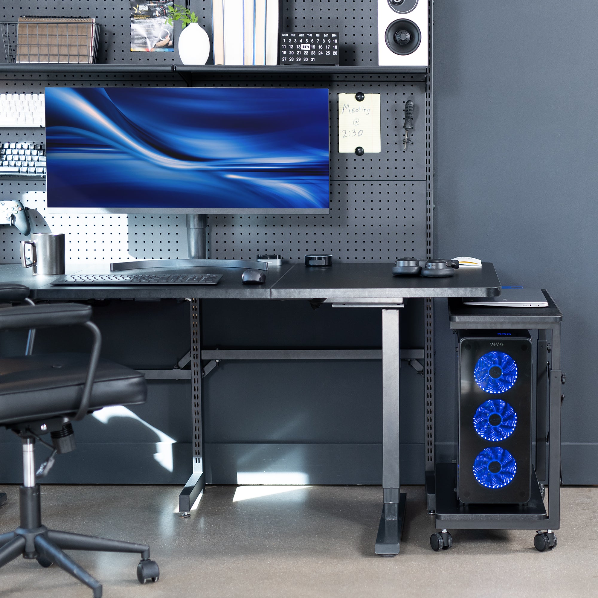 Mobile adjustable PC cart with storage in an office.