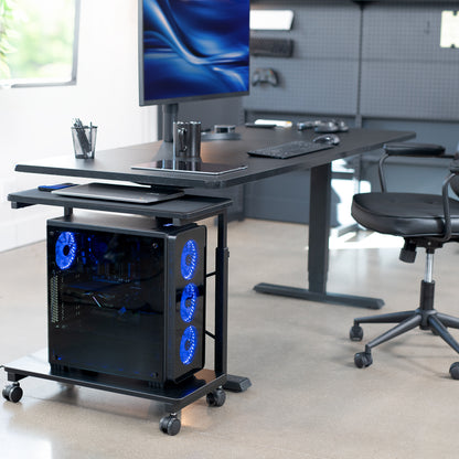 Mobile adjustable PC cart with storage in an office.