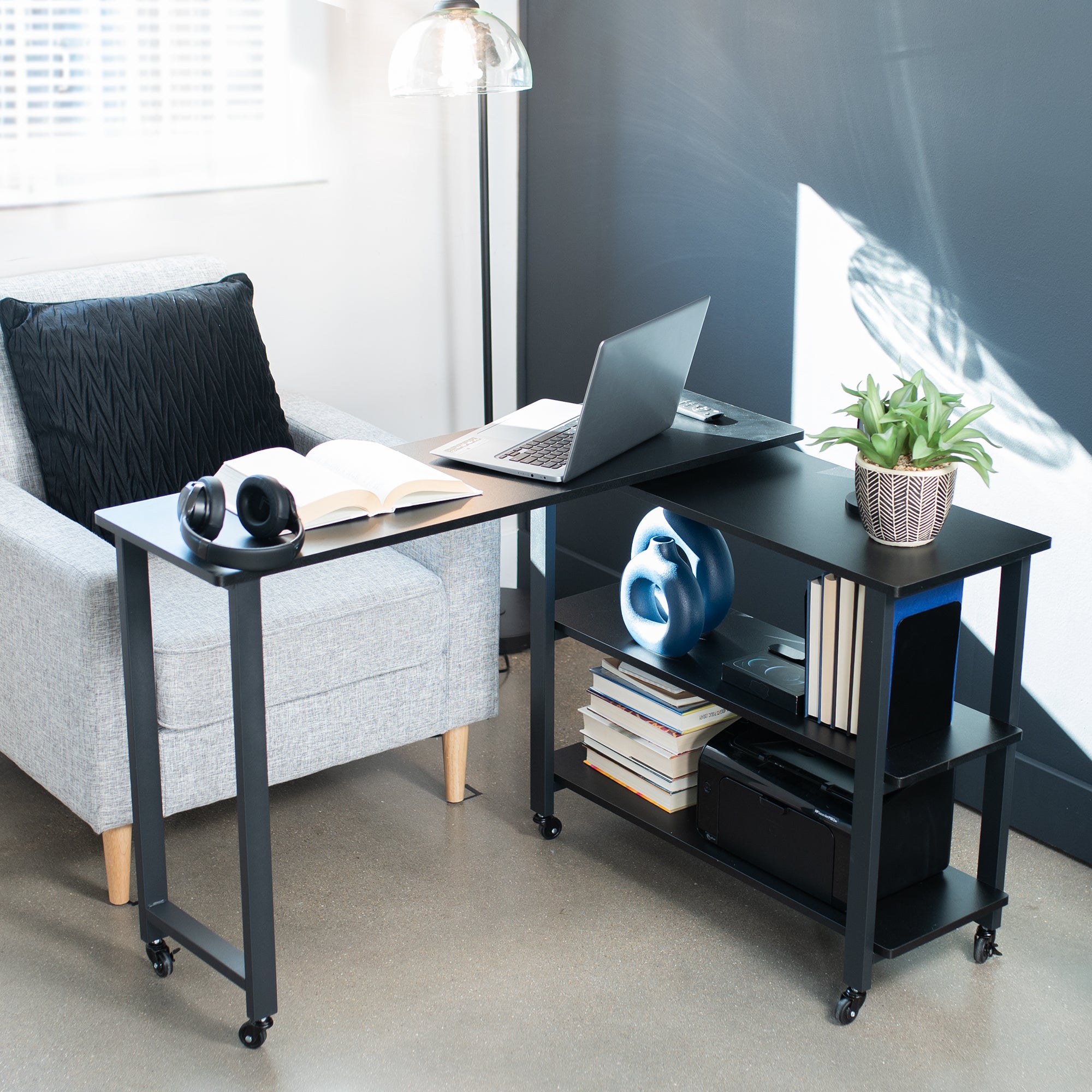 Sleek modern swing out mobile sofa table with shelves and locking wheels.