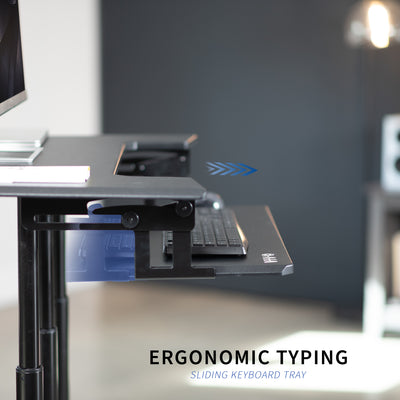 Ergonomic mobile adjustable computer workstation cart with sliding keyboard tray for ergonomic typing.