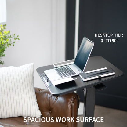 Sleek mobile foldable laptop desk with height adjustment and tilt. Can fold away to store behind furniture.