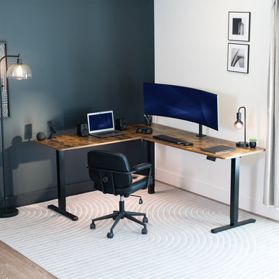 Modern home office with a L-shaped desk, computer setup, and chair.