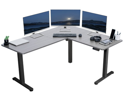 Heavy-duty electric height adjustable corner desk workstation for active sit or stand efficient workspace.