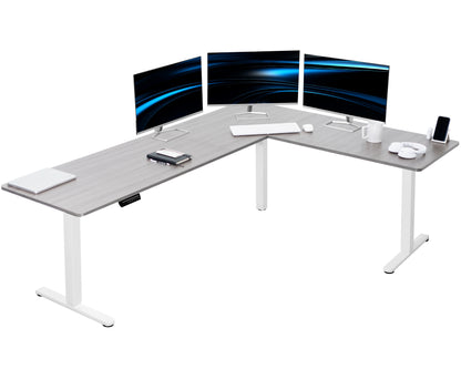 Electric heavy-duty large corner desk workstation for modern office workspaces.