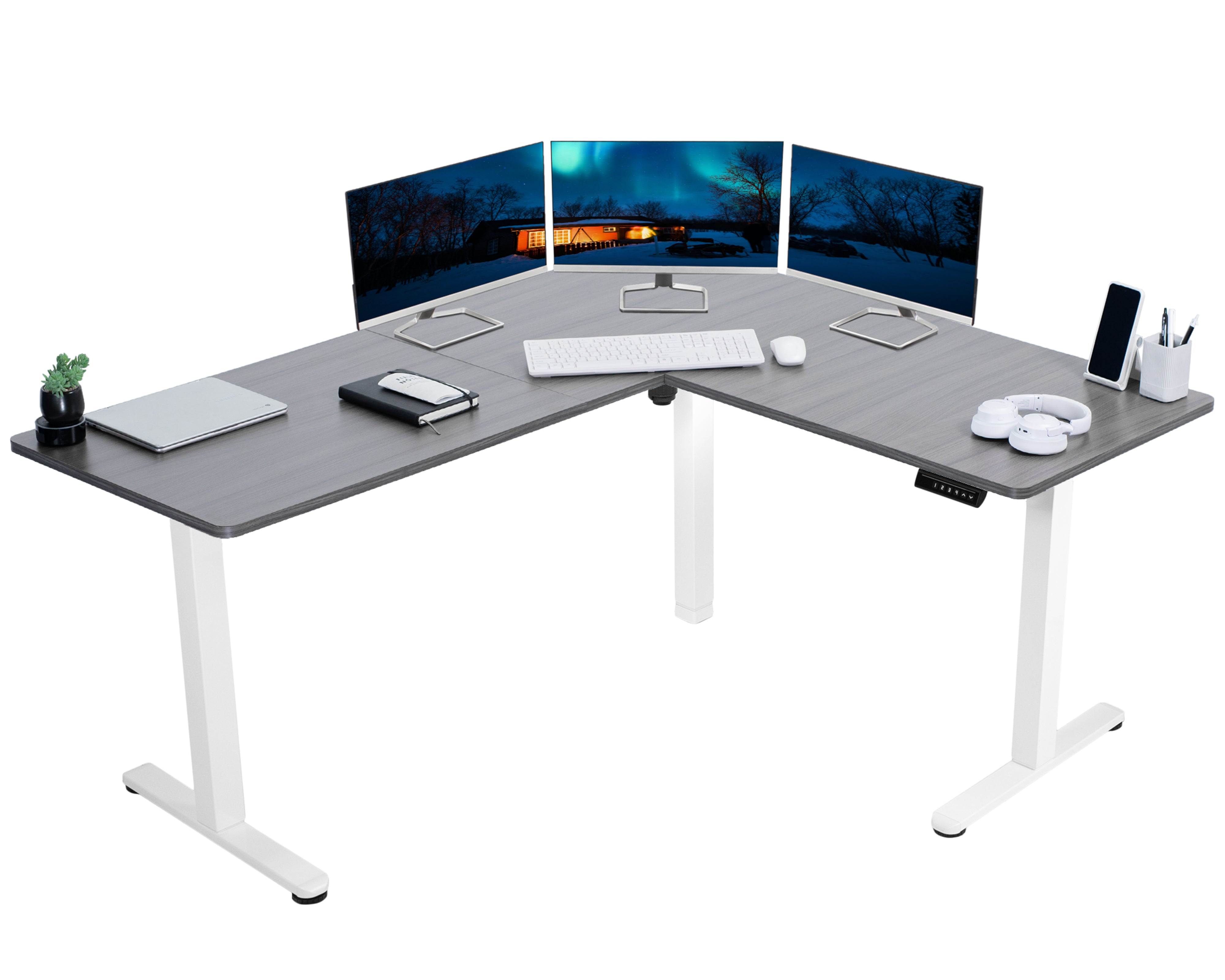 Electric heavy-duty corner desk workstation for modern office workspaces.