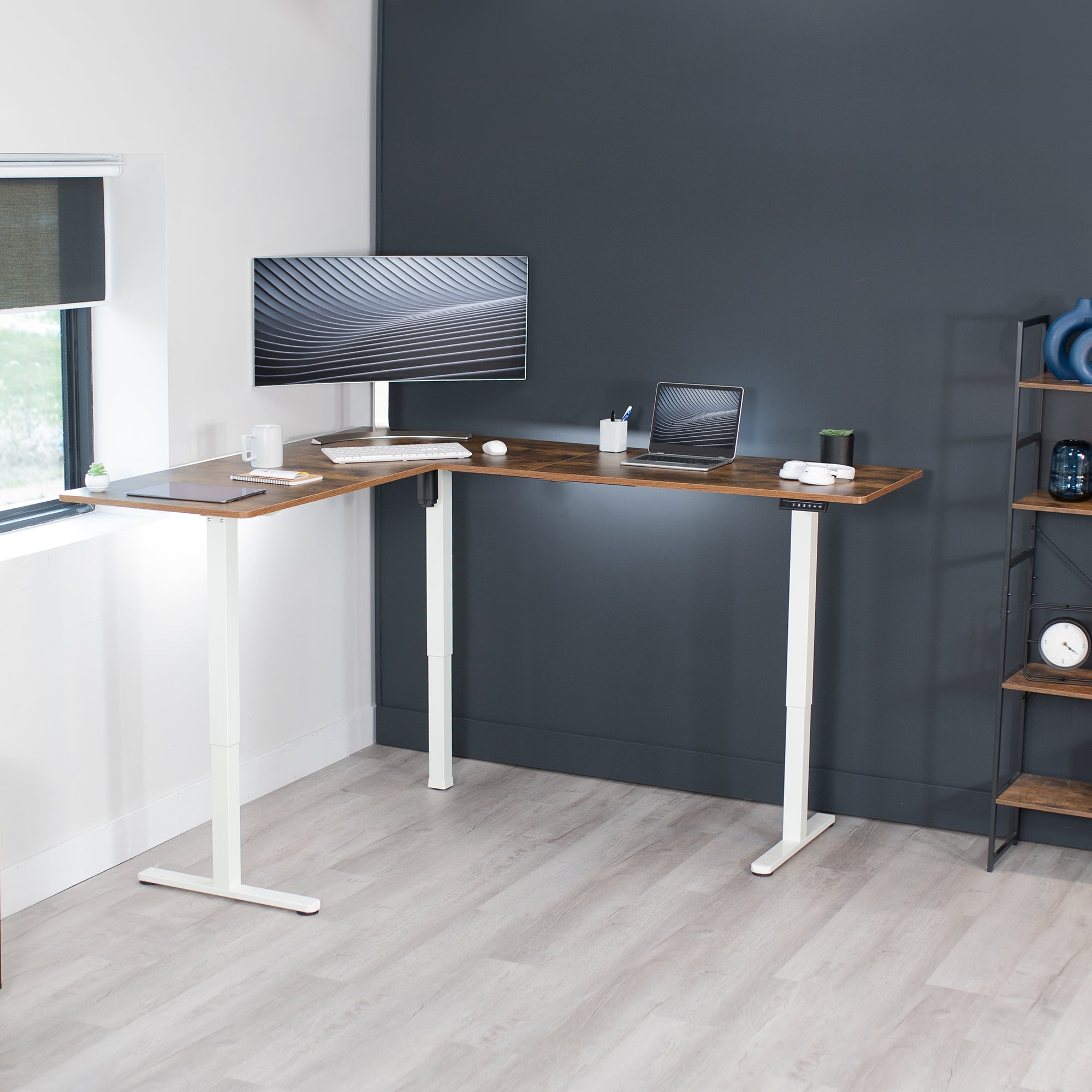 Electric heavy-duty, rustic corner desk workstation for modern office workspaces.