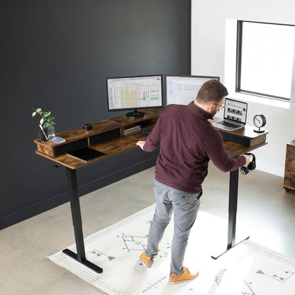 Spacious workstation surface with built-in shelving supporting multiple monitors.