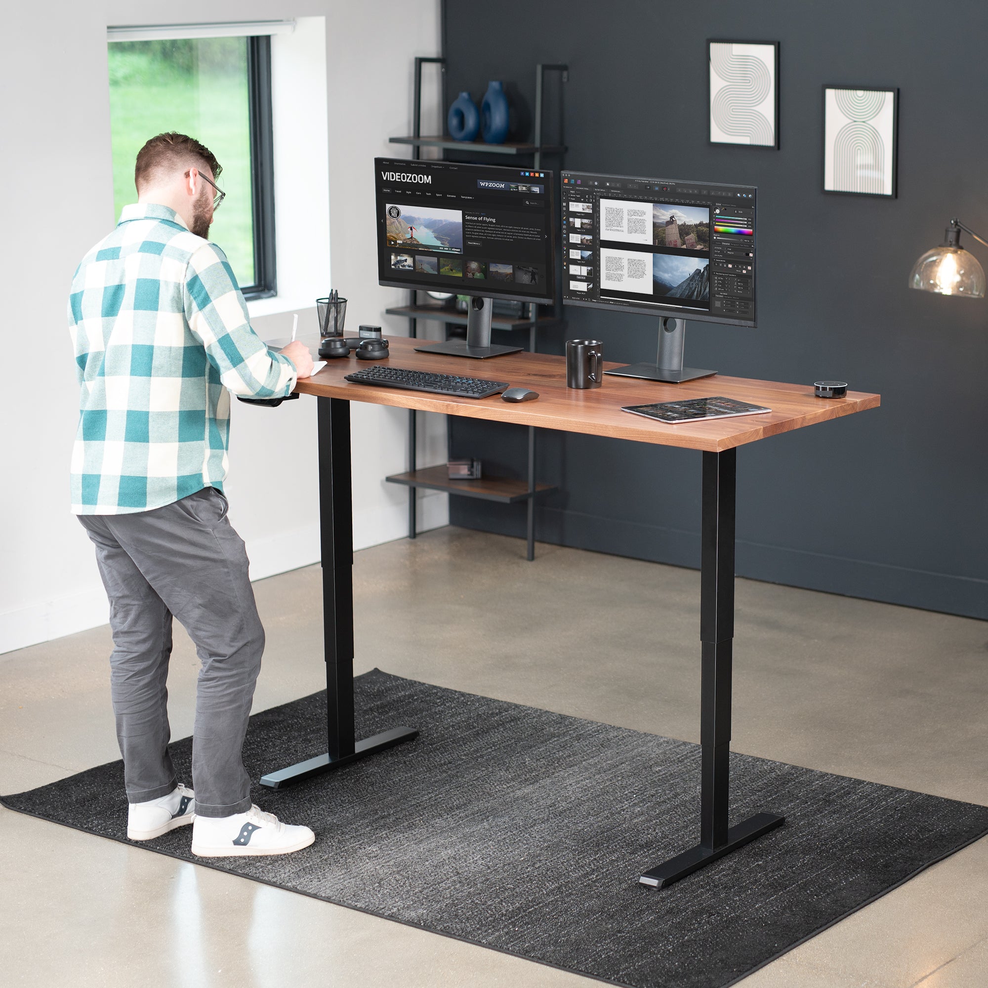 Electric height adjustable dual motor desk frame with programmable memory controller.