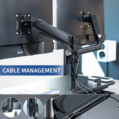 Height adjustable desk riser with articulating pneumatic dual monitor mount featuring cable management.