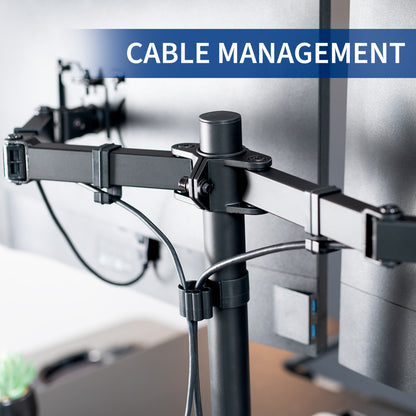 Height adjustable desk riser with articulating dual monitor mount featuring cable management.