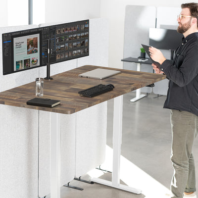 60 x 30 inch electric desk featuring easy height adjustment with the simple 2-button controller