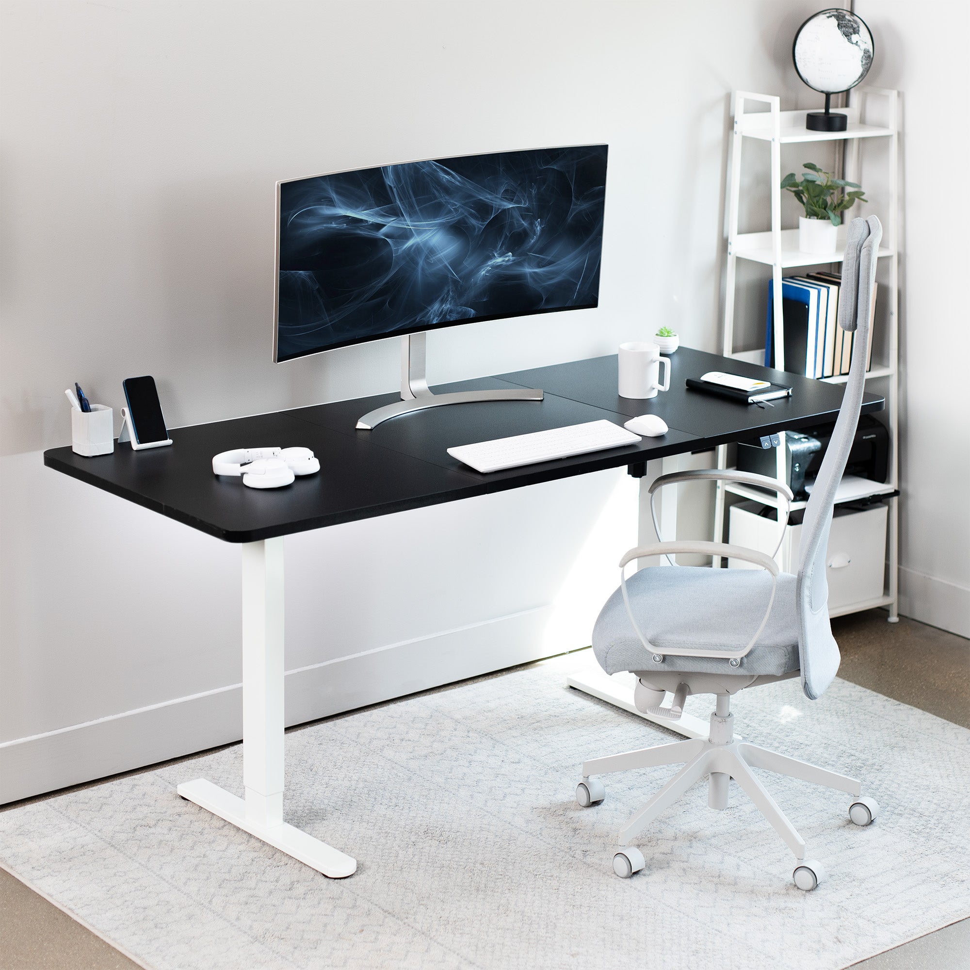 Wide surface sturdy sit or stand active workstation with adjustable height using 2 button control panel.