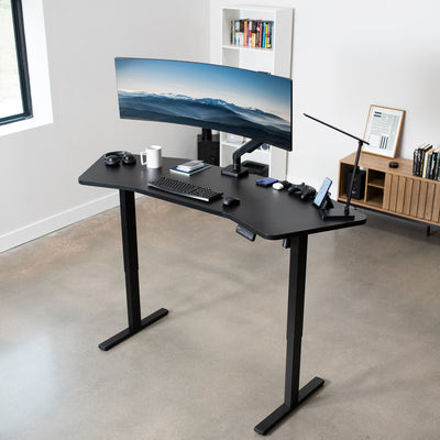  Ergonomic office space with stand-up level desk and ultrawide monitor mount.