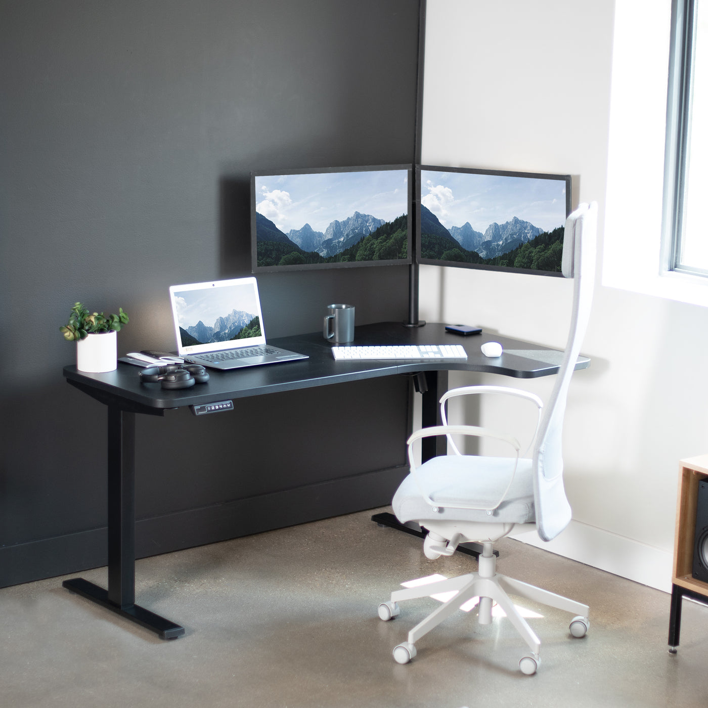 Wide and smooth height range of ergonomic electric sit-to-stand desk.
